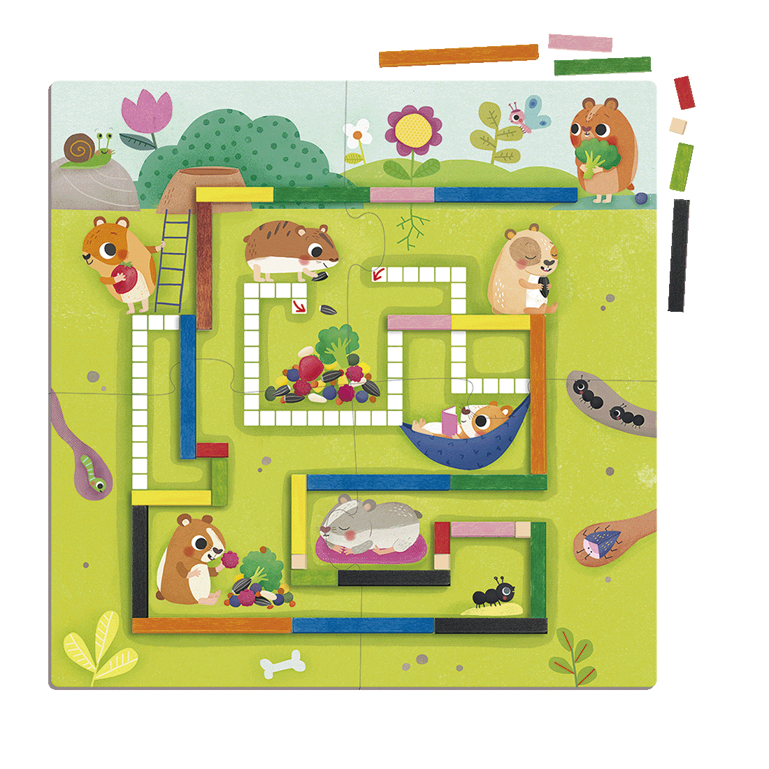 Gra logiczna z figurkami chomików i labiryntem na zielonym tle. Obecne są różne obiekty i przeszkody.