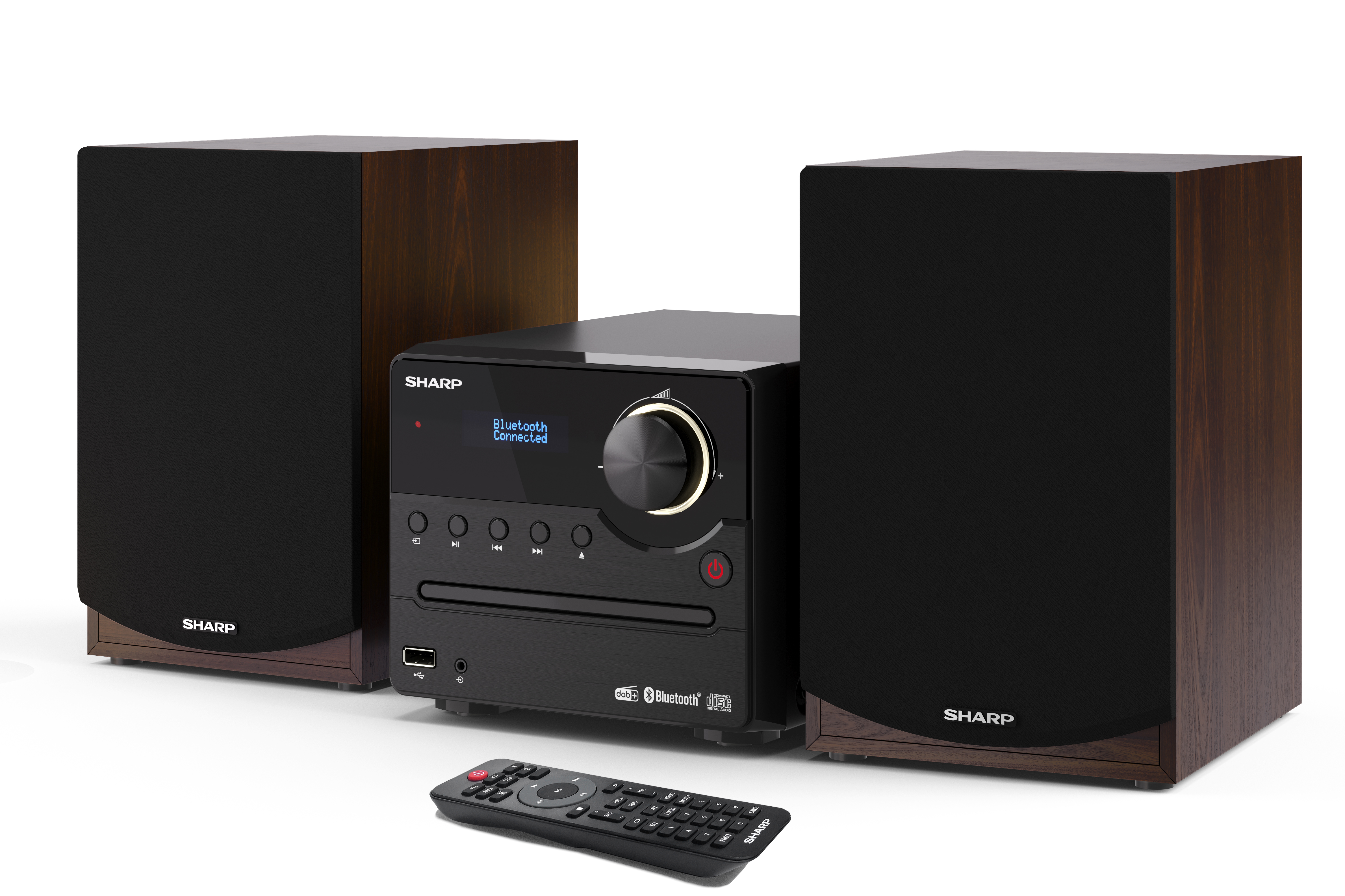 Sharp Stereoanlage mit Lautsprechern, CD-Player und Fernbedienung auf Weiß.