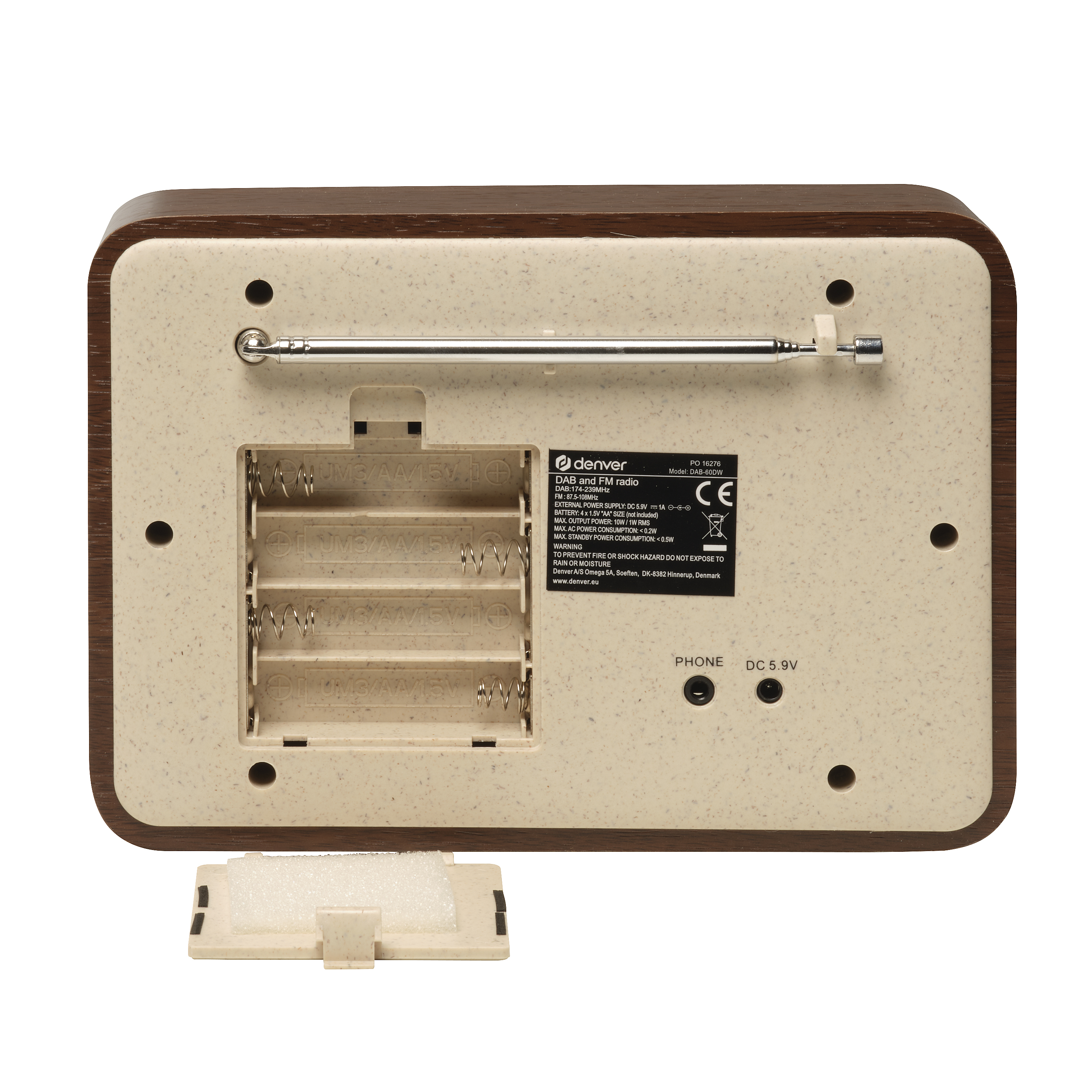 Tył brązowo-beżowego radia z otwartym schowkiem na baterie i wysuniętą anteną.