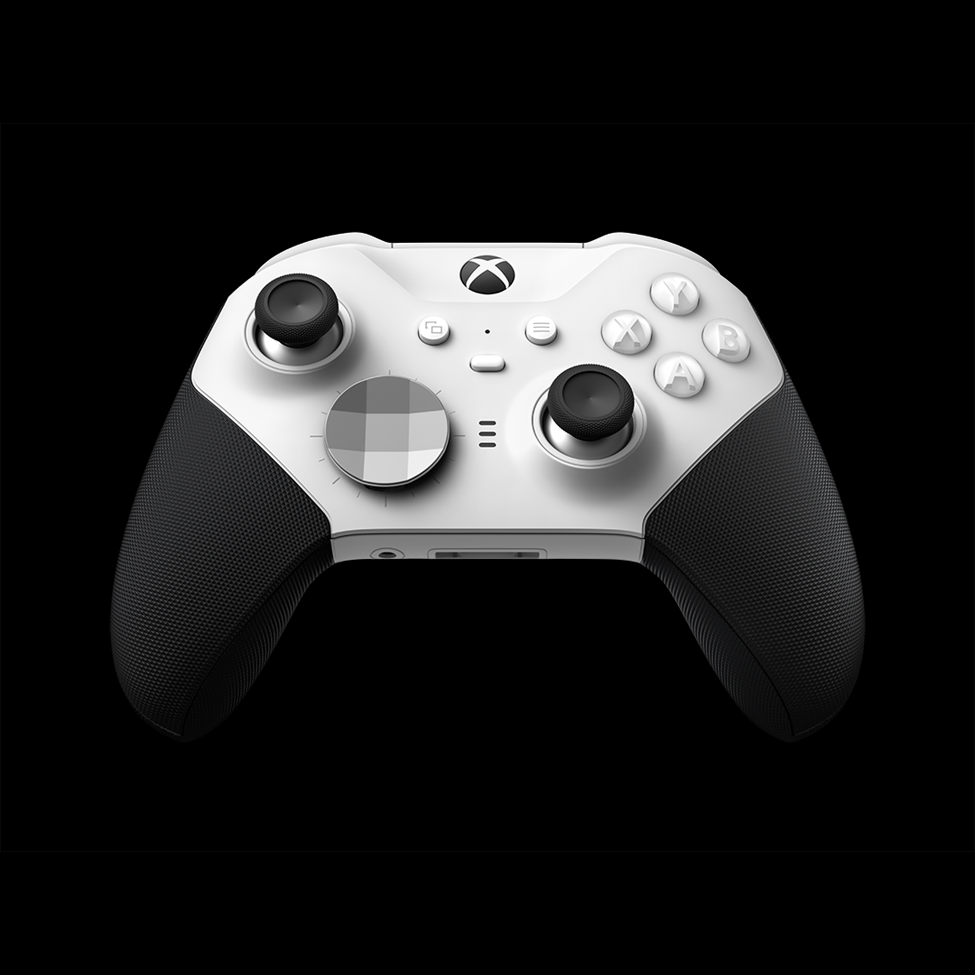 Kontroler Xbox Elite Series 2. Jest biało-czarny, na czarnym tle.