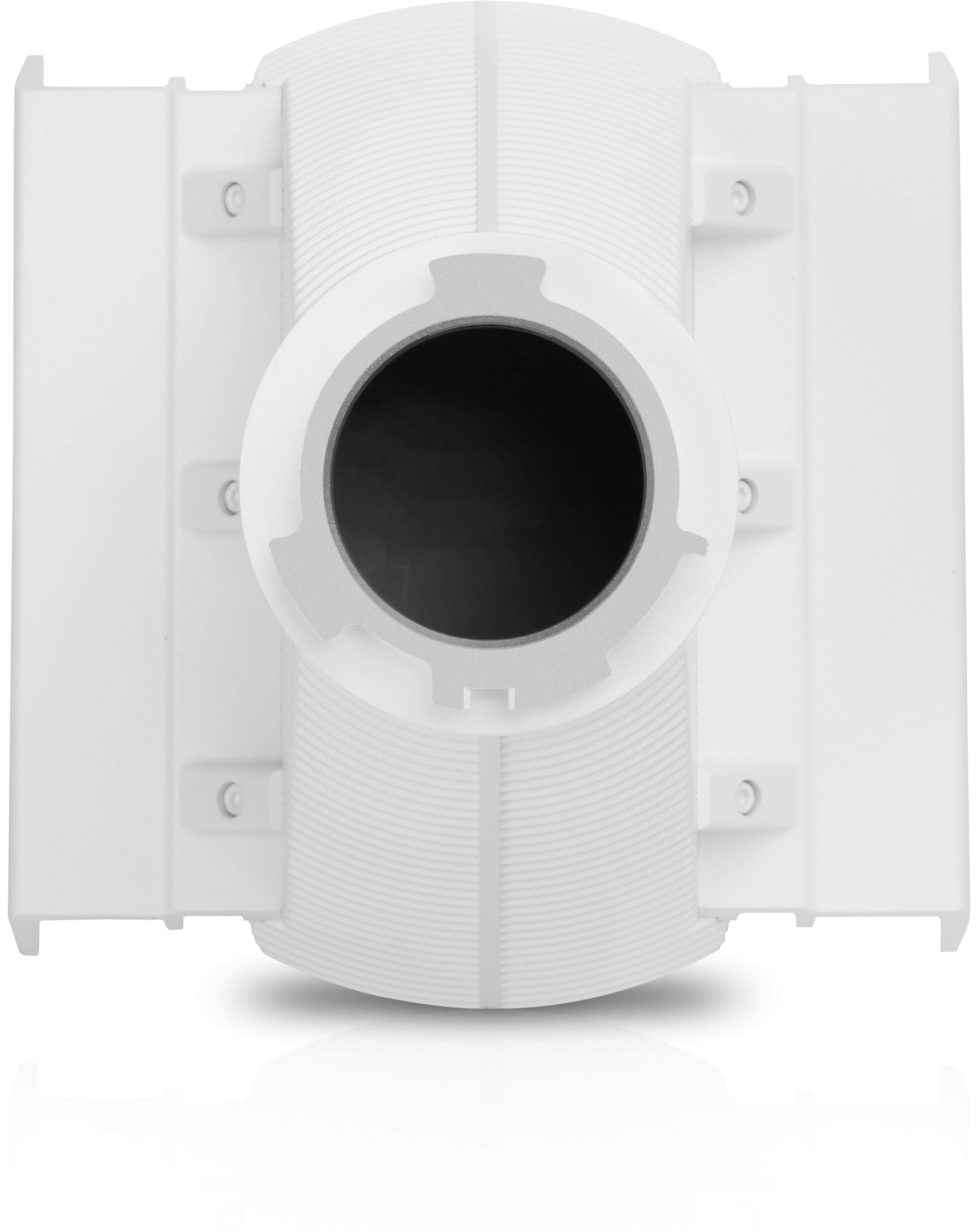 Białe plastikowe urządzenie z ciemnym centralnym otworem i panelami bocznymi.