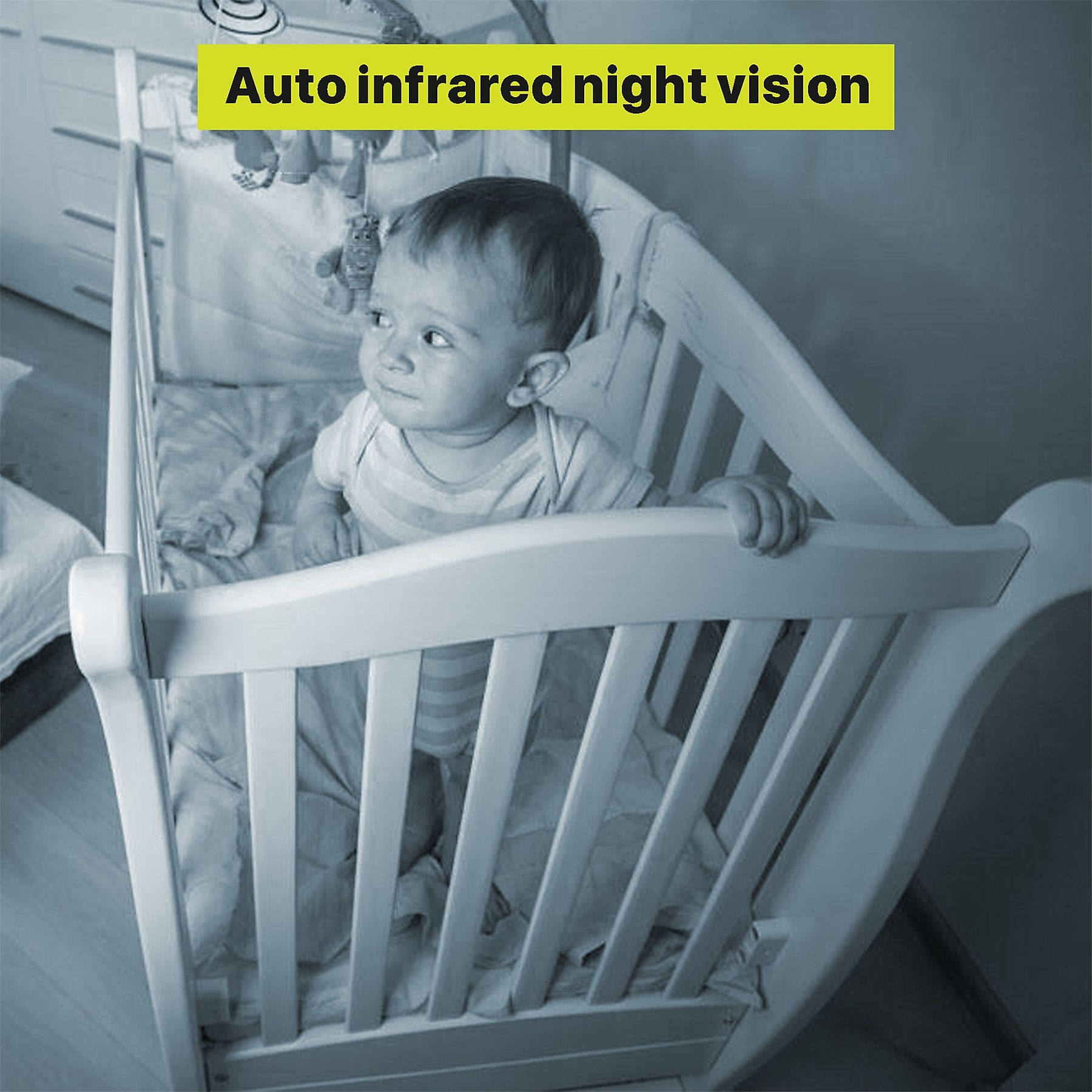 Baby im Kinderbett, blickt weg. Text lautet 'Auto-Infrarot-Nachtsicht'.