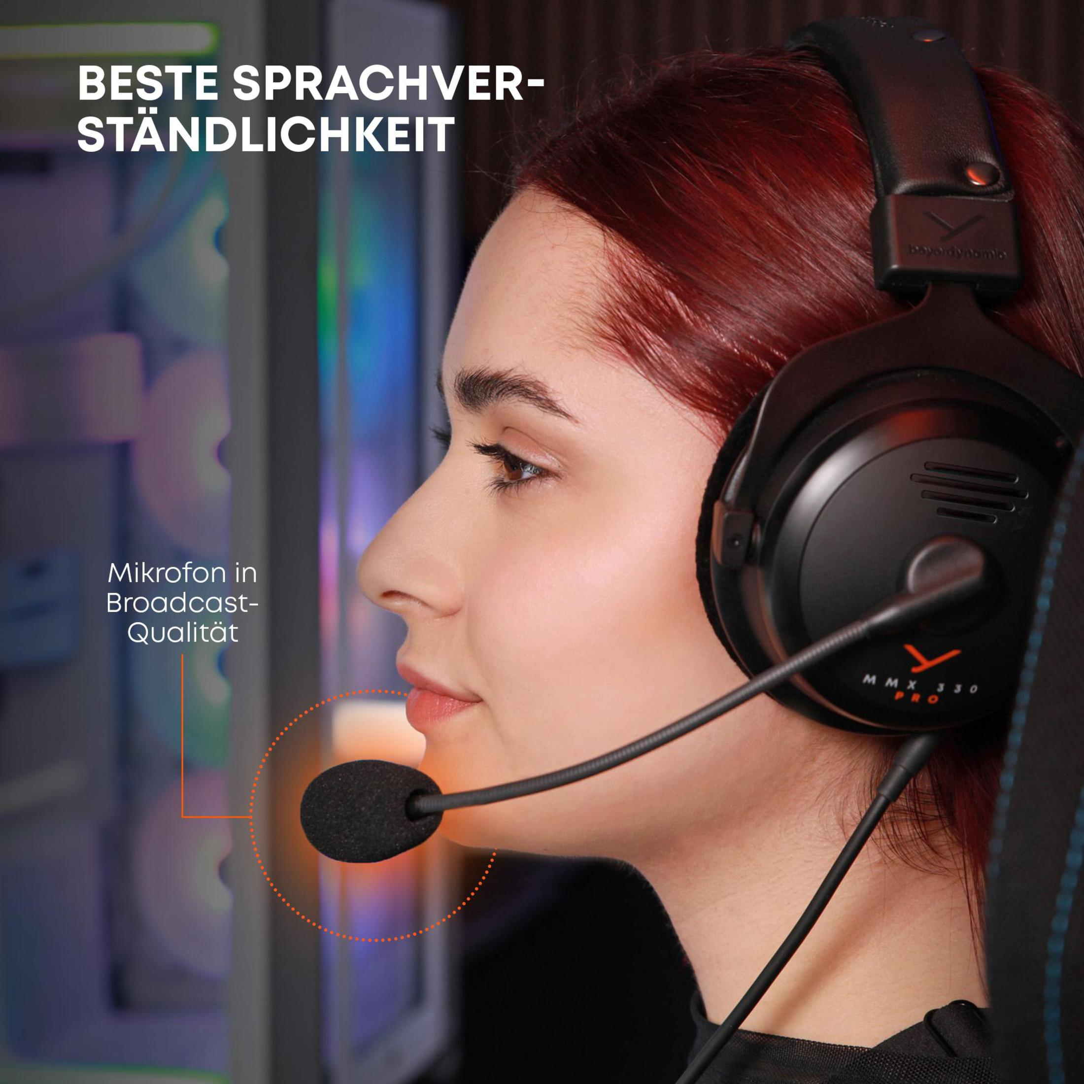 A woman wearing a headset with a microphone. Text indicates microphone quality, and the headset is black.