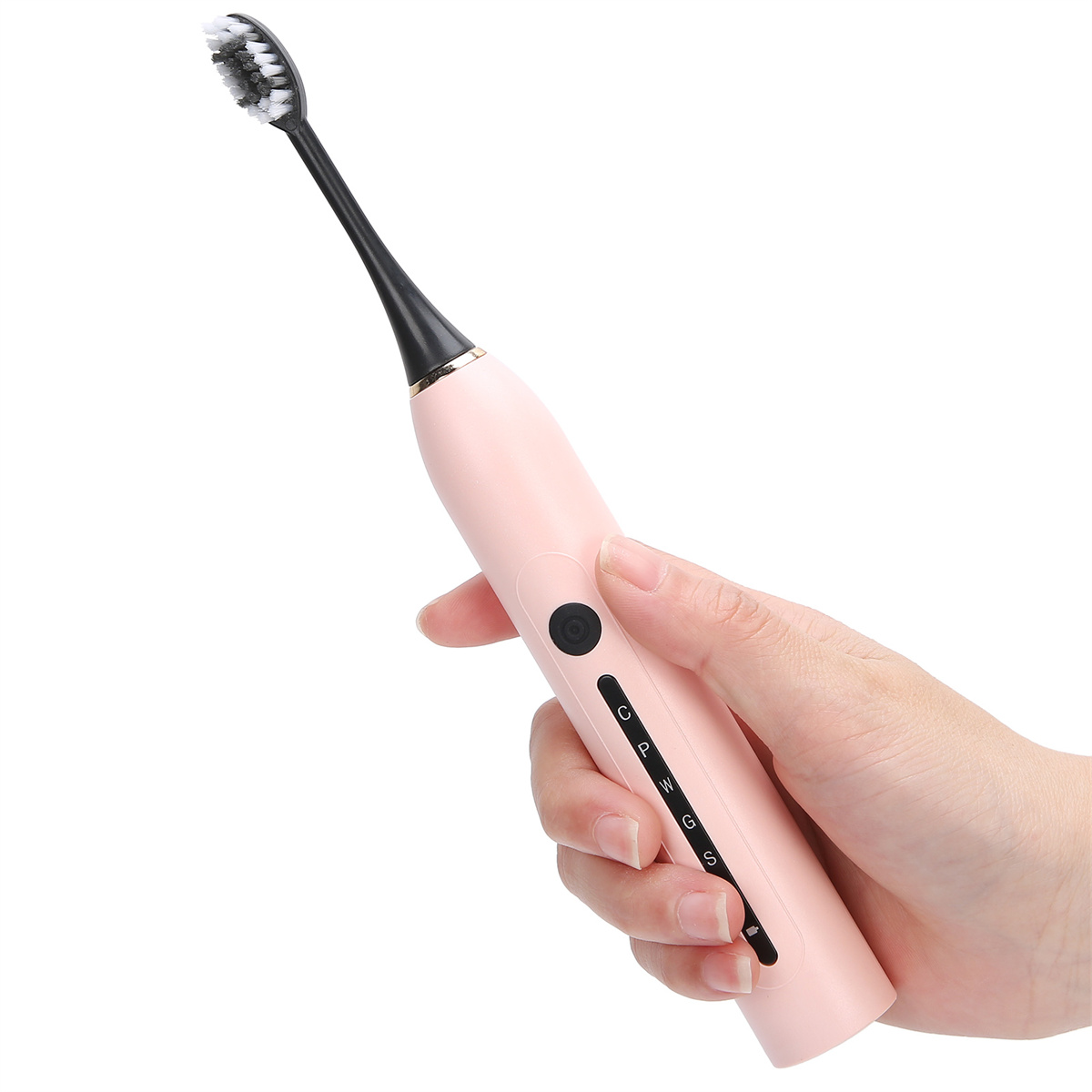 Eine rosa elektrische Zahnbürste, die von einer Hand gehalten wird. Es hat schwarze Borsten.