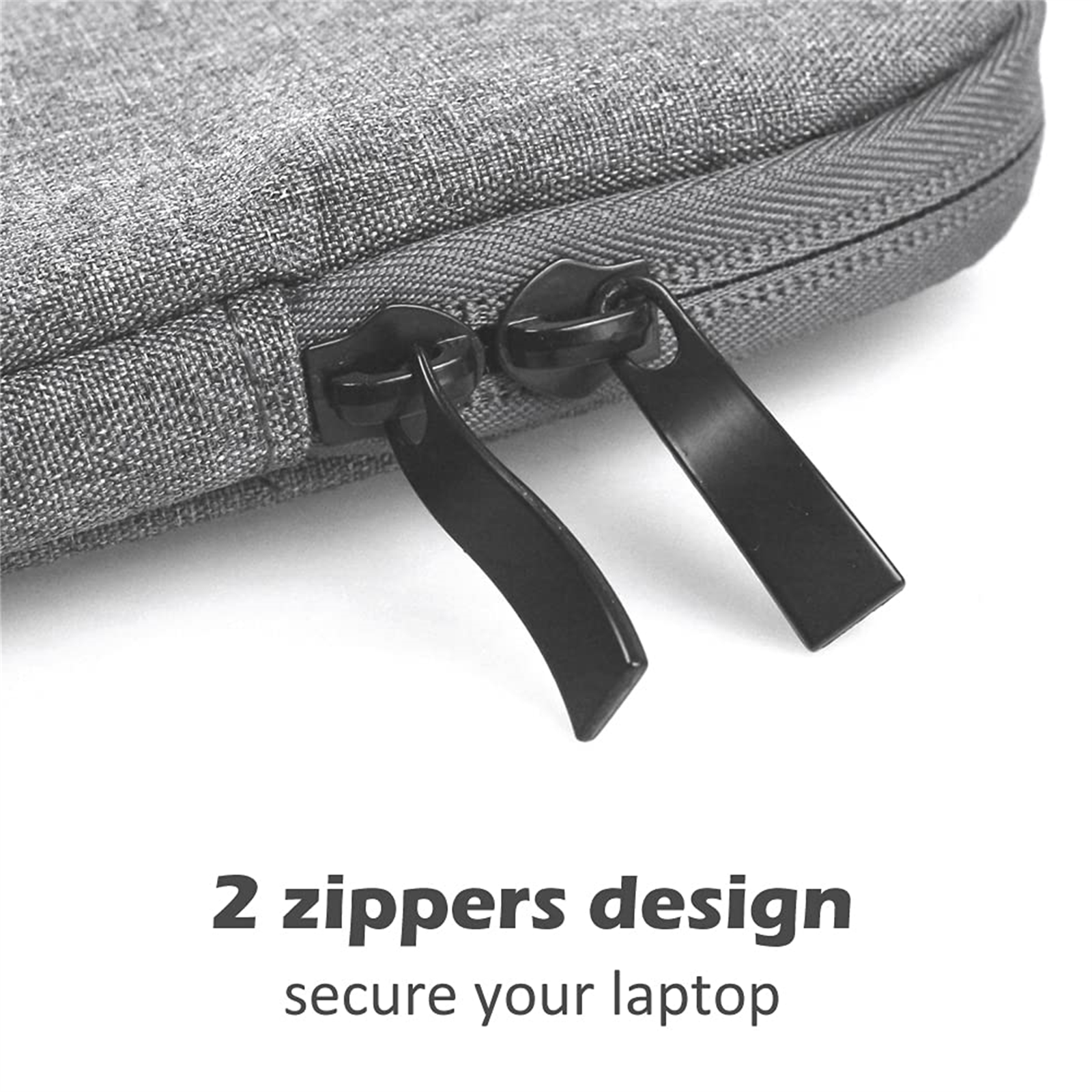 Eine graue Laptoptasche mit zwei schwarzen Reißverschlüssen, beschriftet mit '2 zippers design'.
