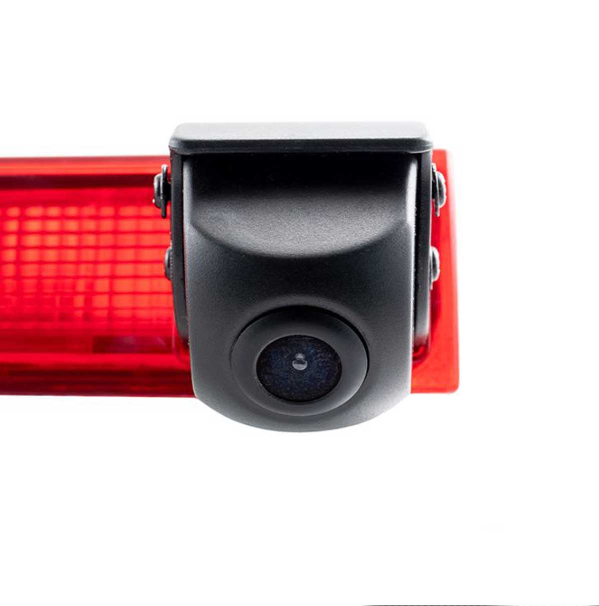 Eine schwarze Autokamera ist an einem roten Licht befestigt. Die Kamera hat eine Linse in der Mitte. Der Hintergrund ist weiß.
