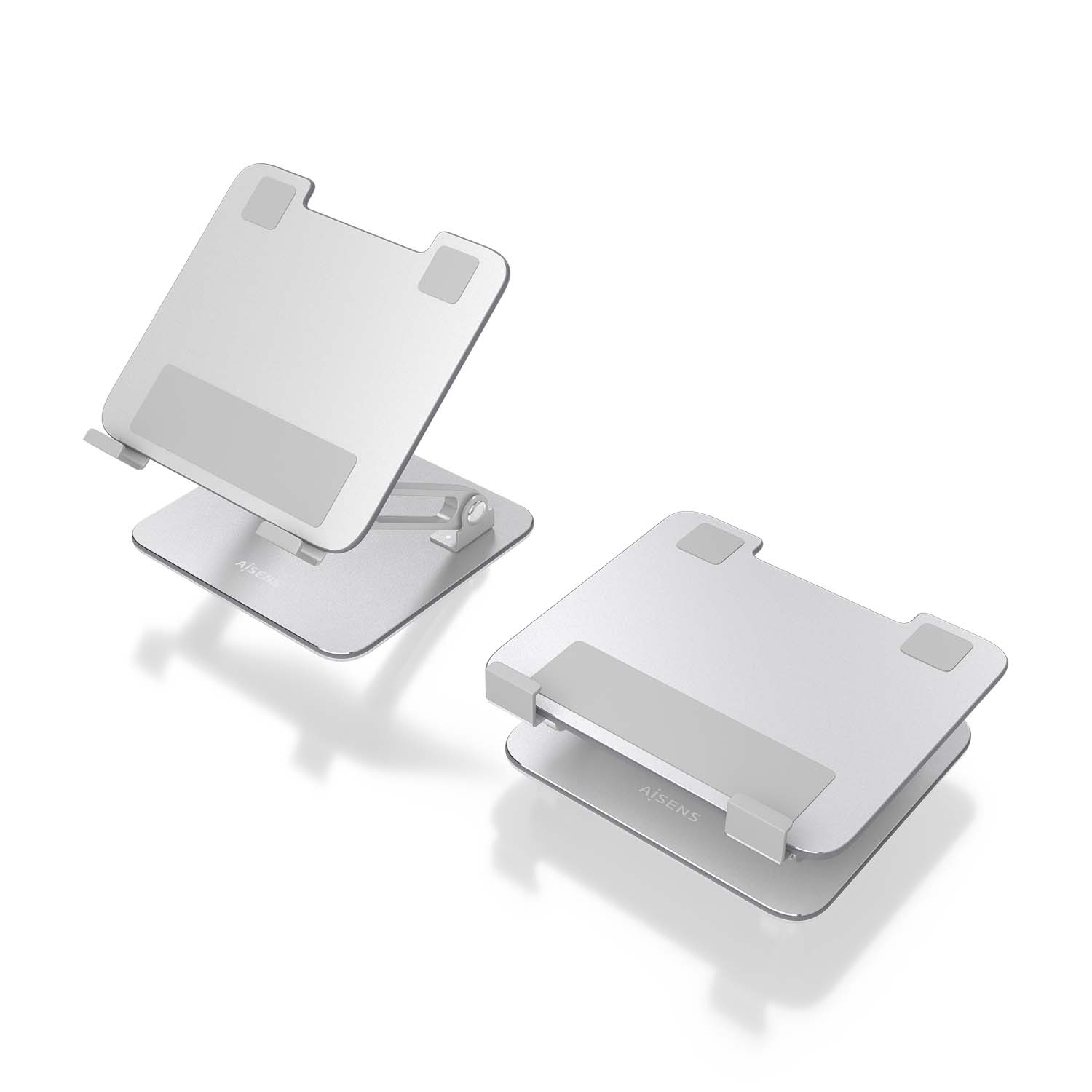 Twee zilveren laptopstandaards, één opgevouwen en één open, op een wit oppervlak.