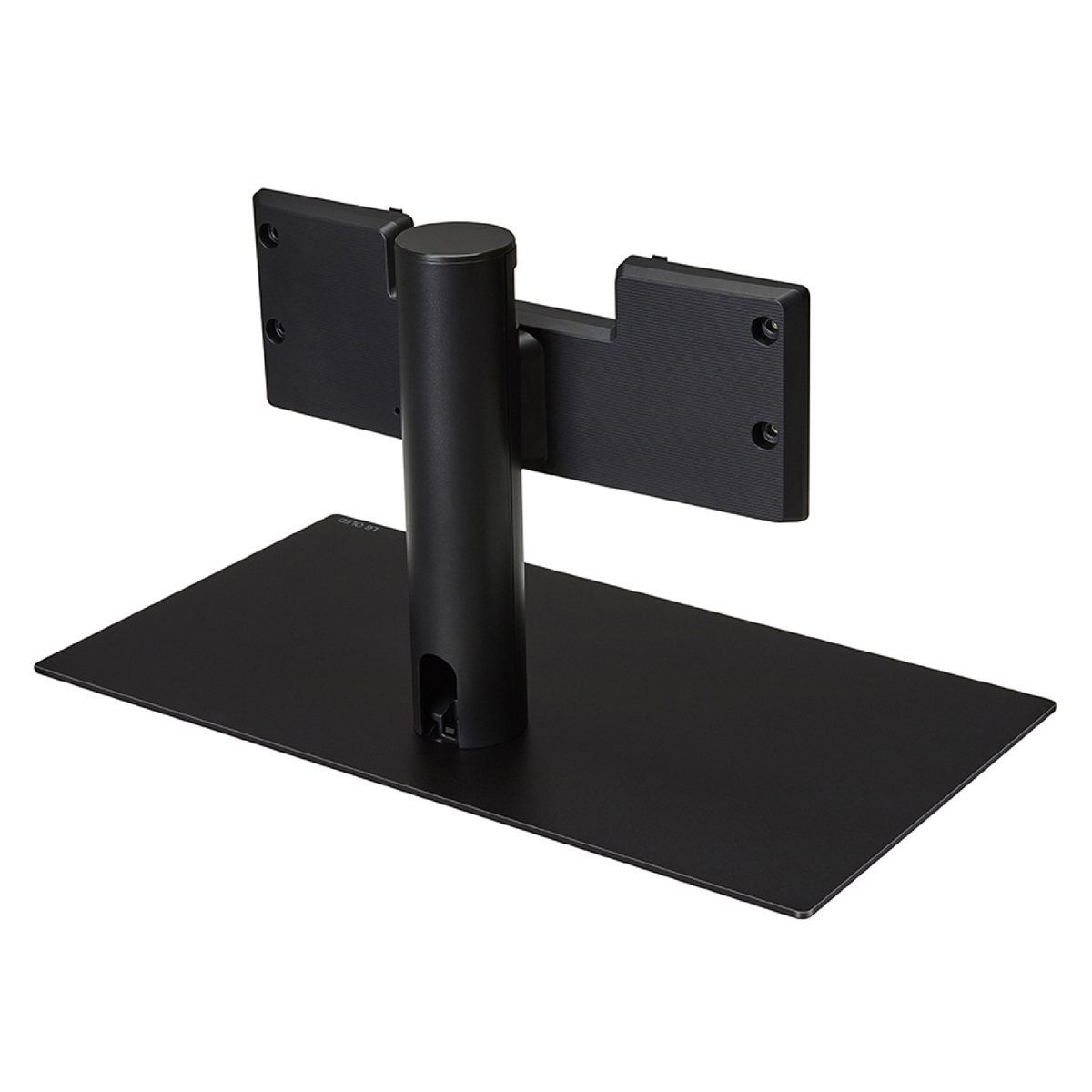 Un soporte de TV negro, con una placa base y una columna de soporte vertical, con una placa de montaje en la parte superior.