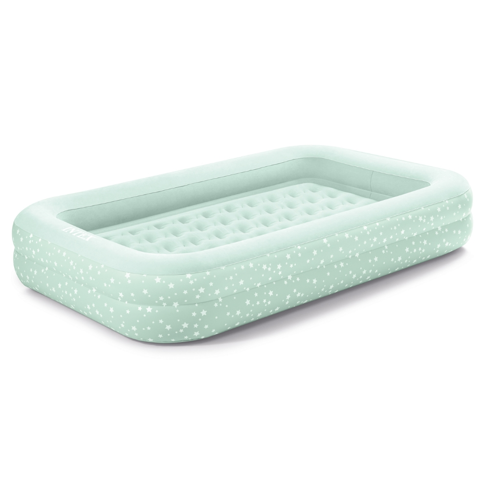 Light green air mattress with white star pattern. Rectangular shape with raised edges.