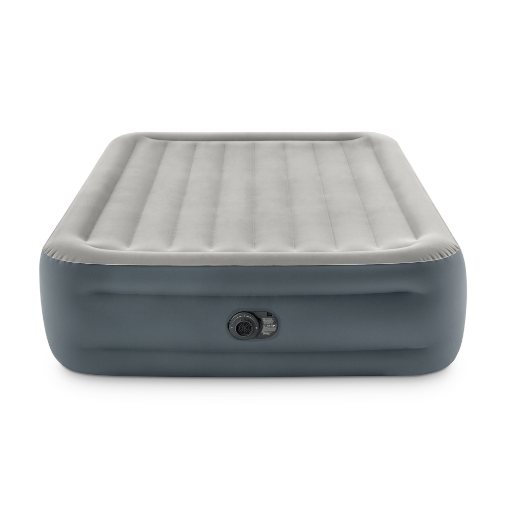 Matelas gonflable gris sur fond blanc, vue latérale, avec une valve.
