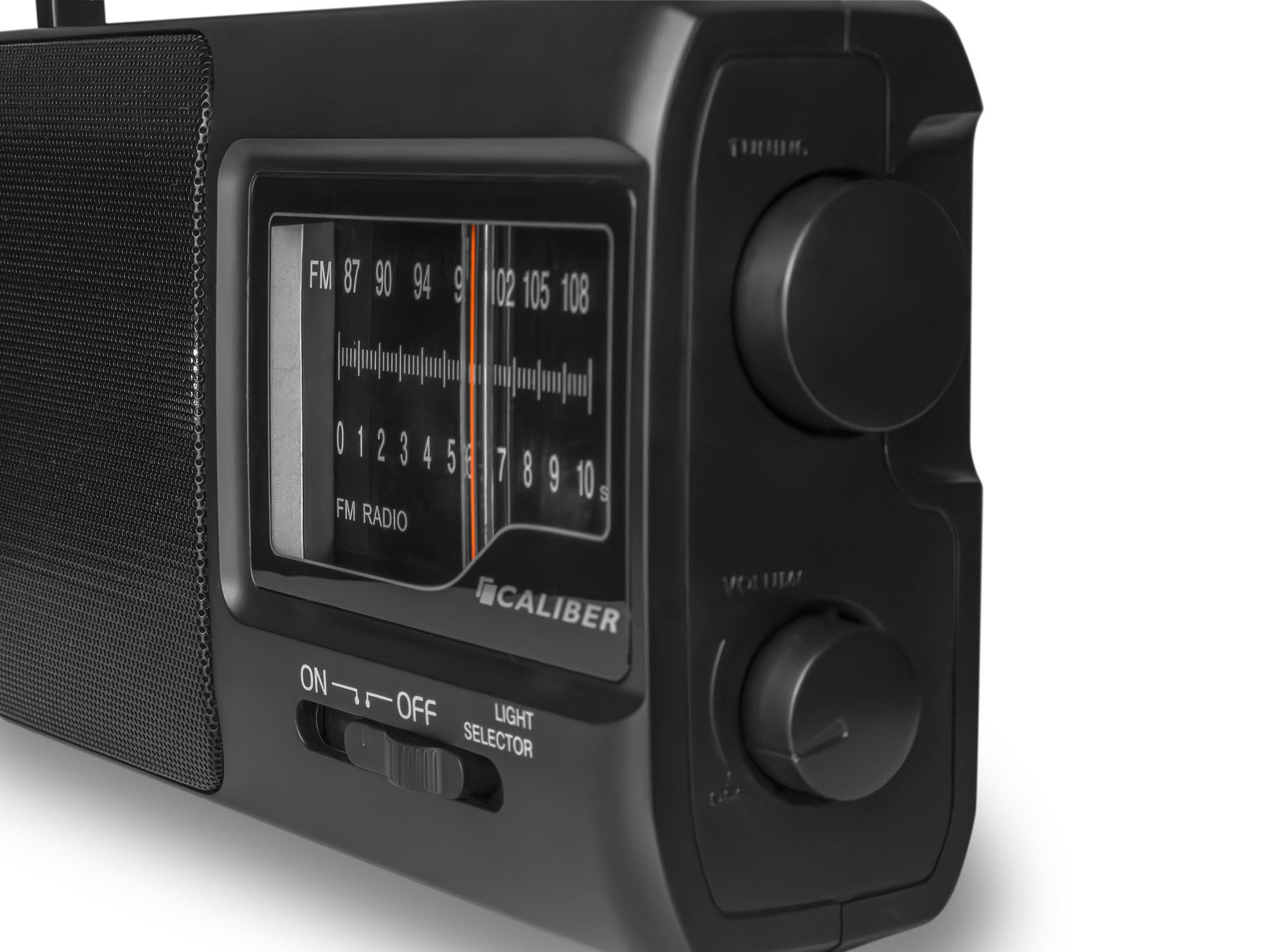 Black FM radio with tuning and volume dials, and an on/off switch. 'CALIBER' label.
