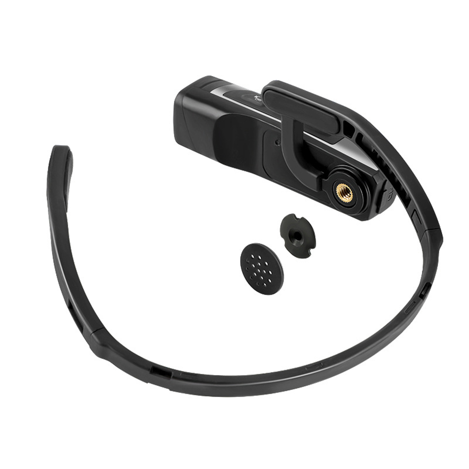 Schwarzes VR-Headset mit Kopfband und zwei zusätzlichen Teilen. Es liegt auf einer weißen Oberfläche.