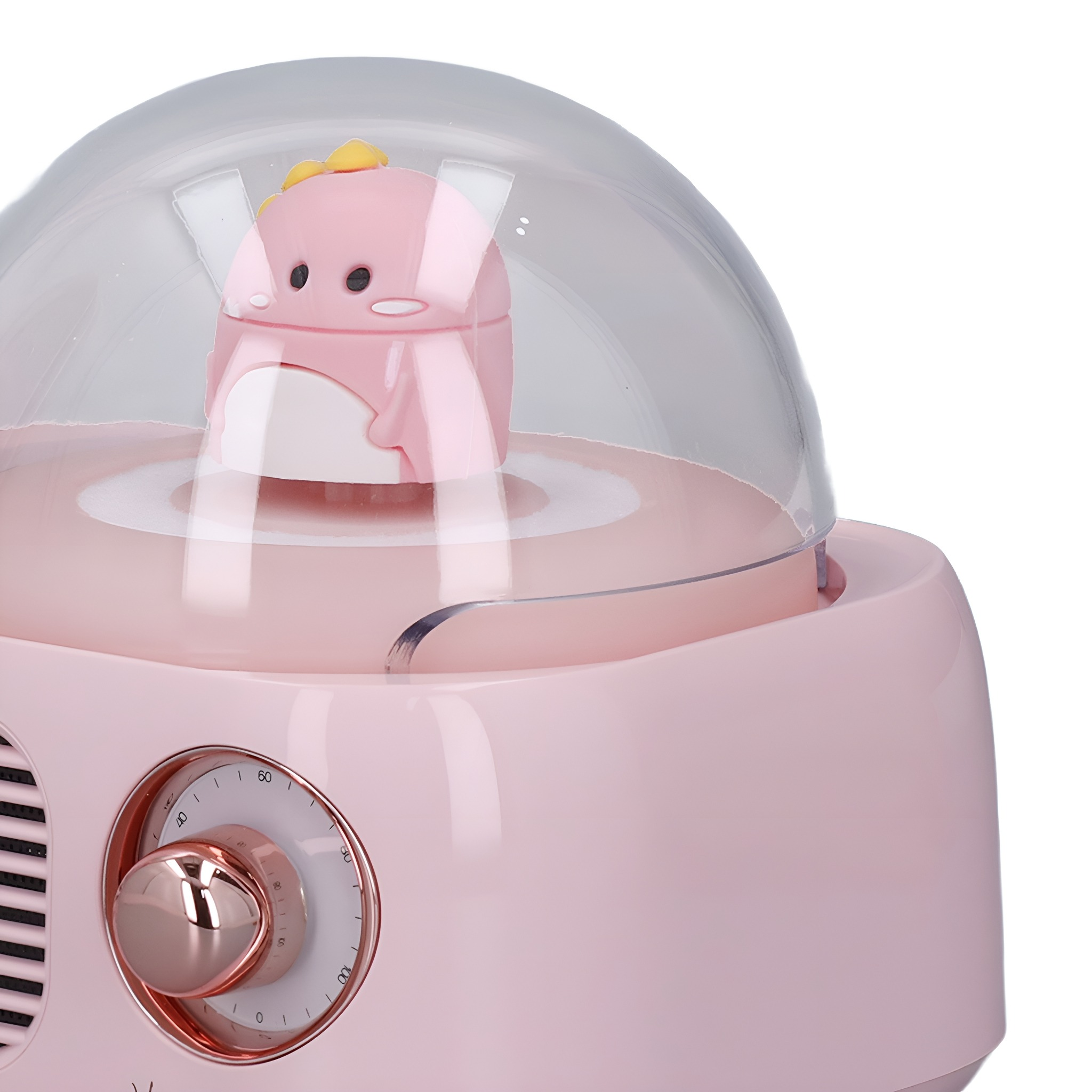 Ein rosa Sterilisator mit einem Dinosaurier-Spielzeug darin. Der Sterilisator hat eine klare Kuppel und roségoldene Details.