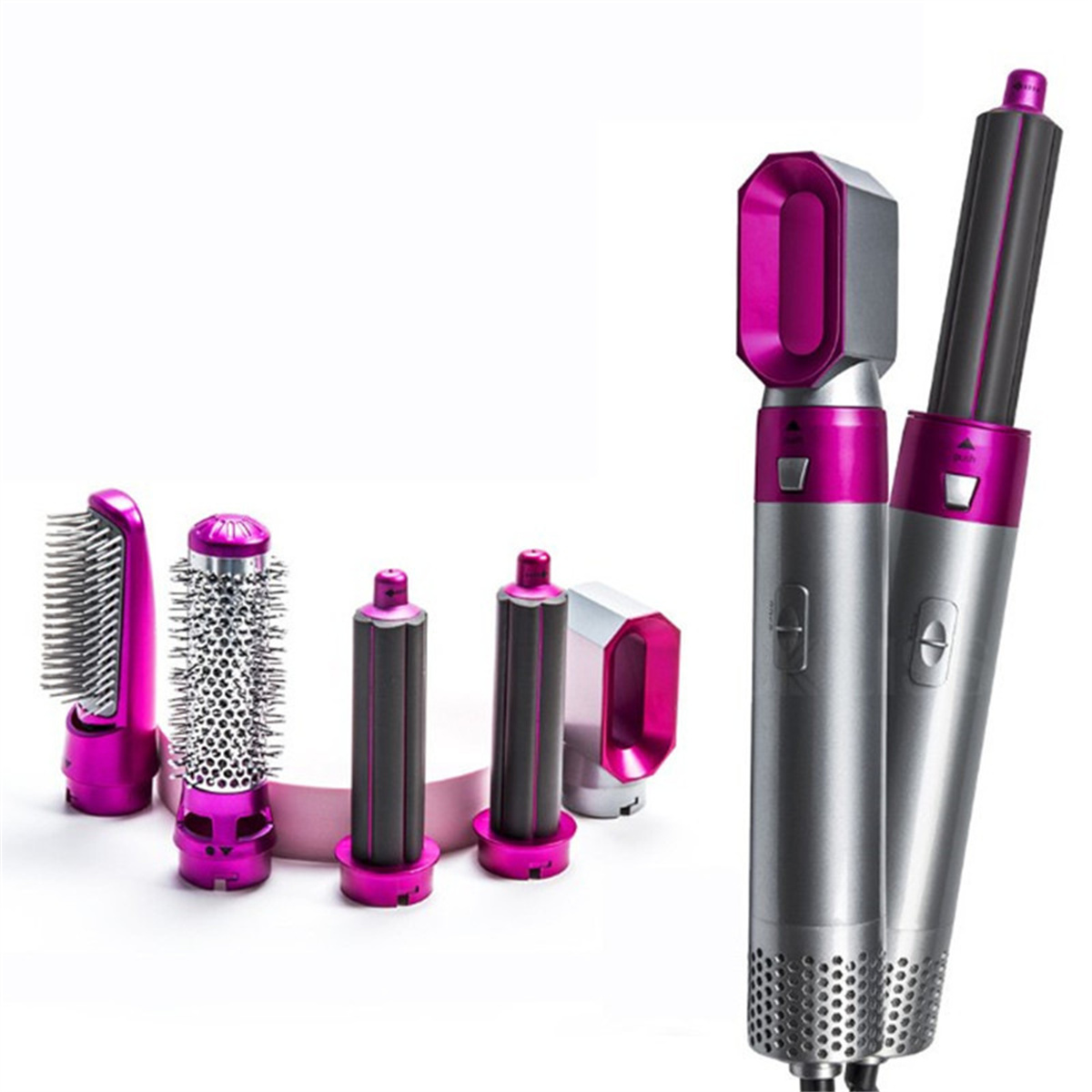Haarstyler mit mehreren Aufsätzen in Rosa und Silber. Weißer Hintergrund.