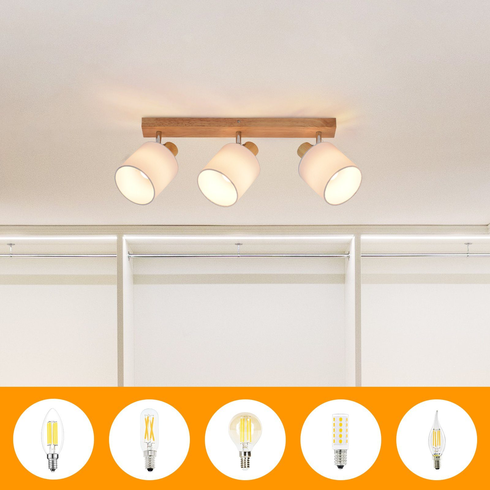 Luci a soffitto con tre paralumi bianchi e tre lampadine sottostanti. Sfondo bianco.