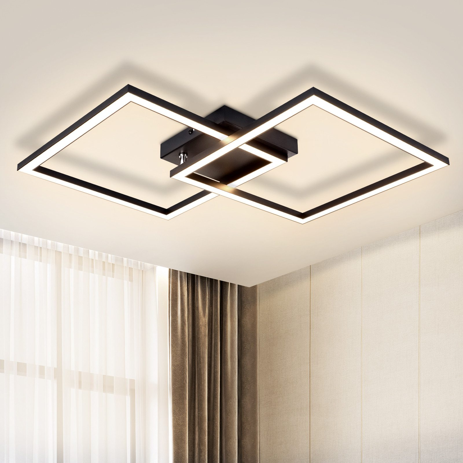 Lampada da soffitto moderna con due cornici quadrate nere. Illumina il soffitto.