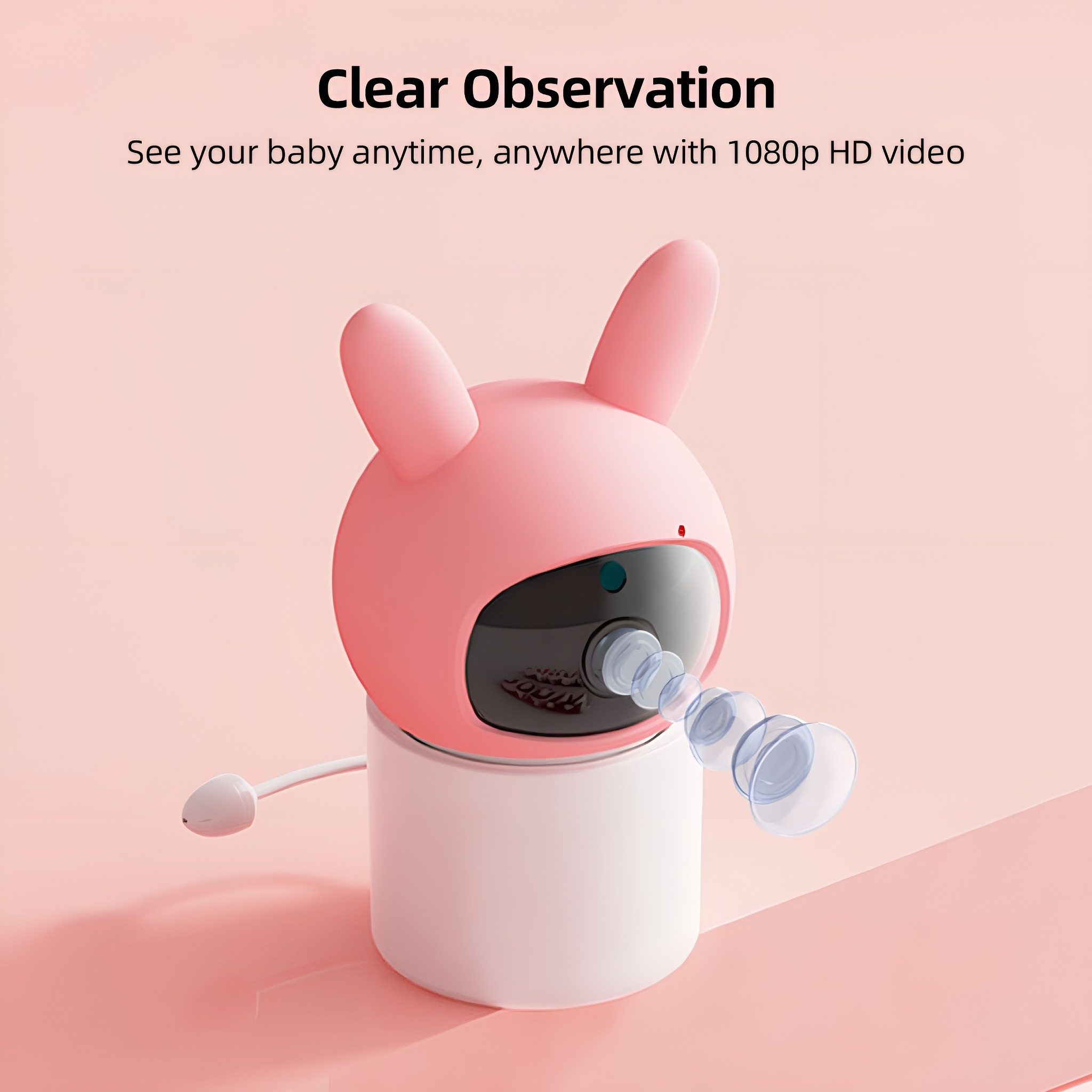 Rosa Babyphone in Hasenform mit weißer Basis. Der Text lautet 'Clear Observation'.