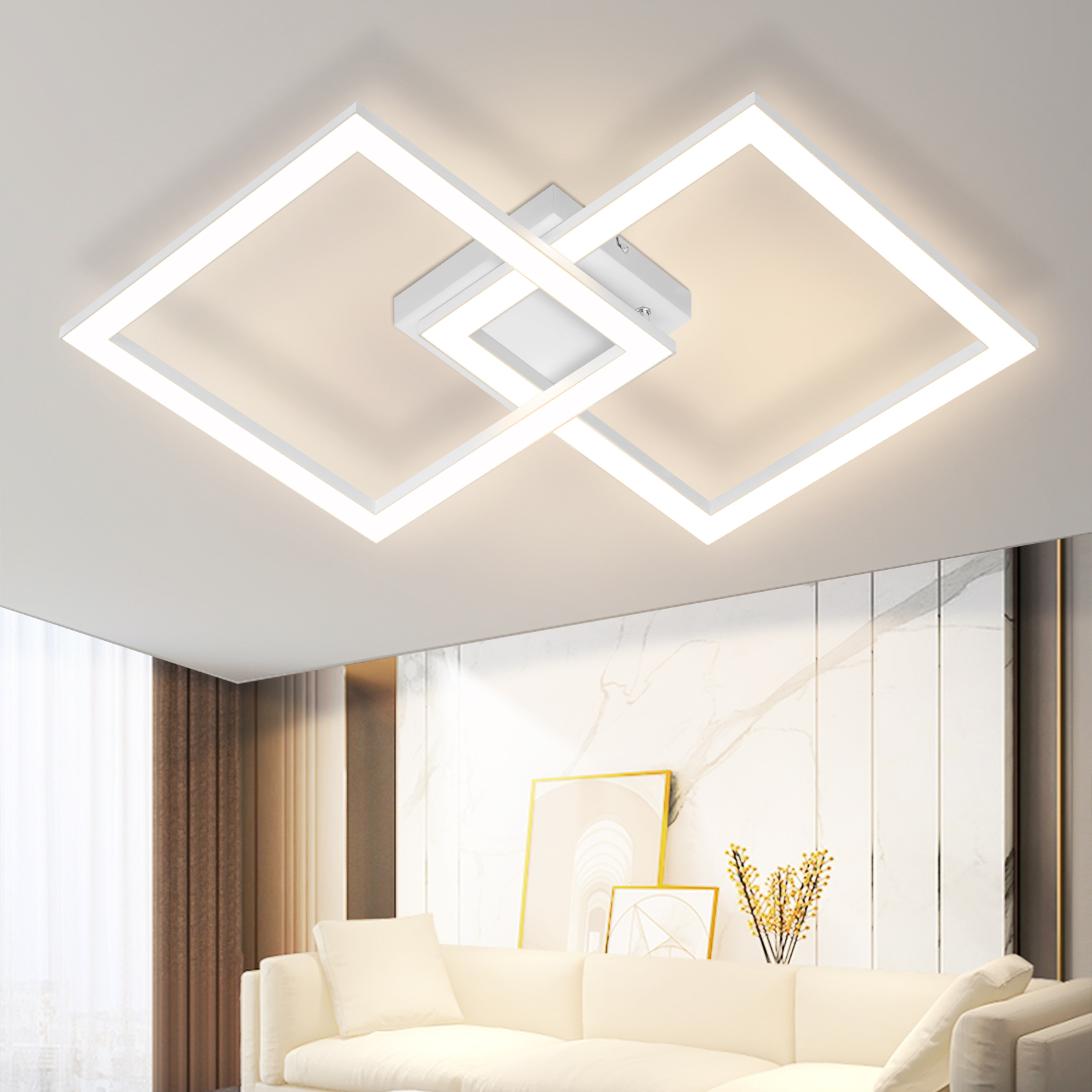 Lampada da soffitto bianca con due cornici quadrate sovrapposte, contro un soffitto e una parete bianchi con decorazioni.