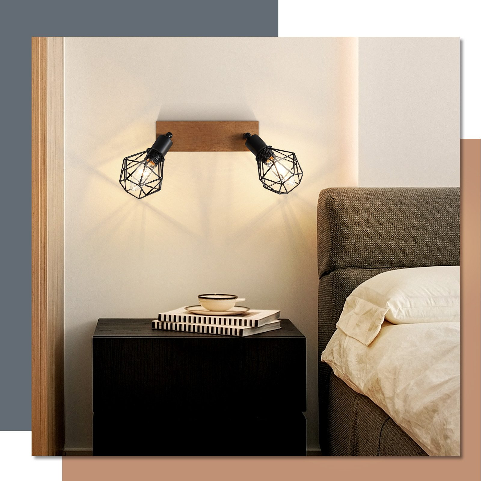Due luci a parete con gabbie di filo nero sopra le lampadine, accanto a un letto e un comodino.