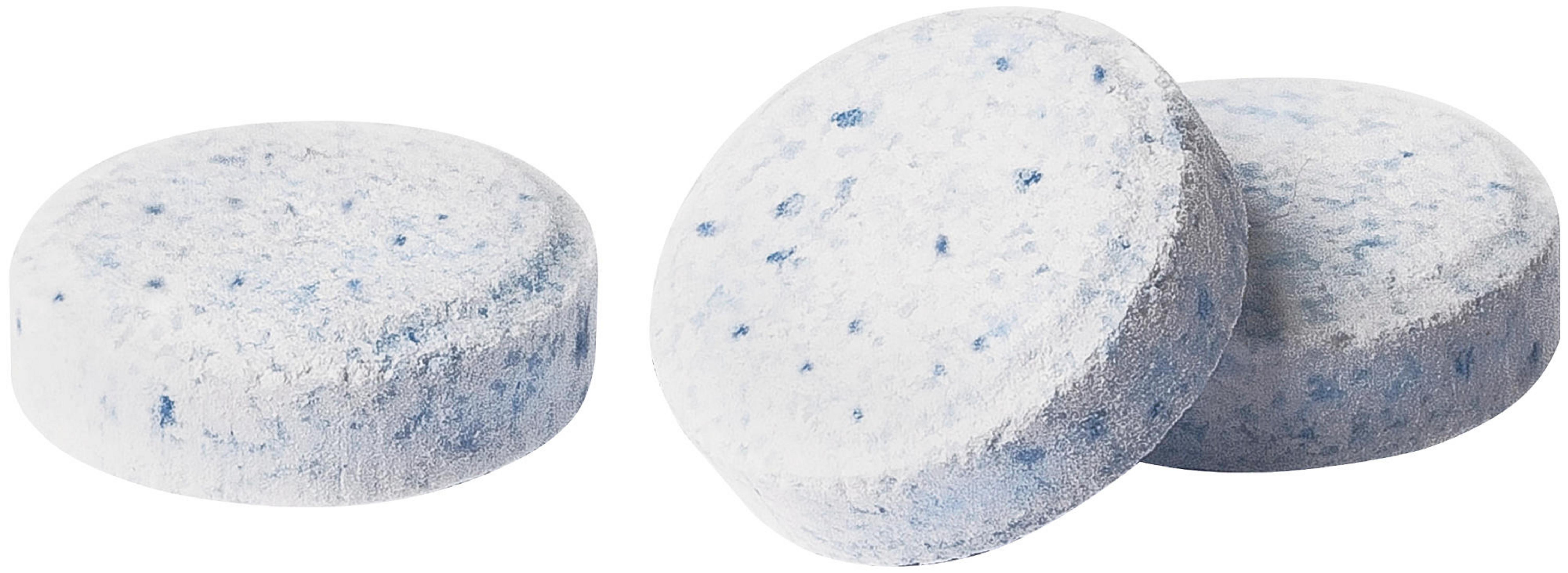 Trzy małe, białe tabletki z niebieskimi plamkami na białym tle.