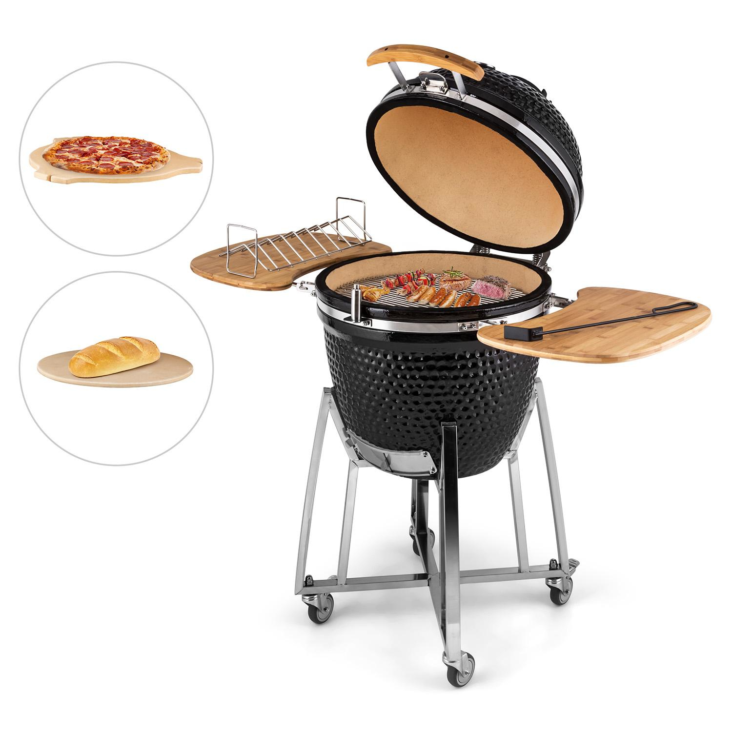 Griglia nera con coperchio aperto. Pizza, pane e articoli da grigliare sui ripiani laterali.