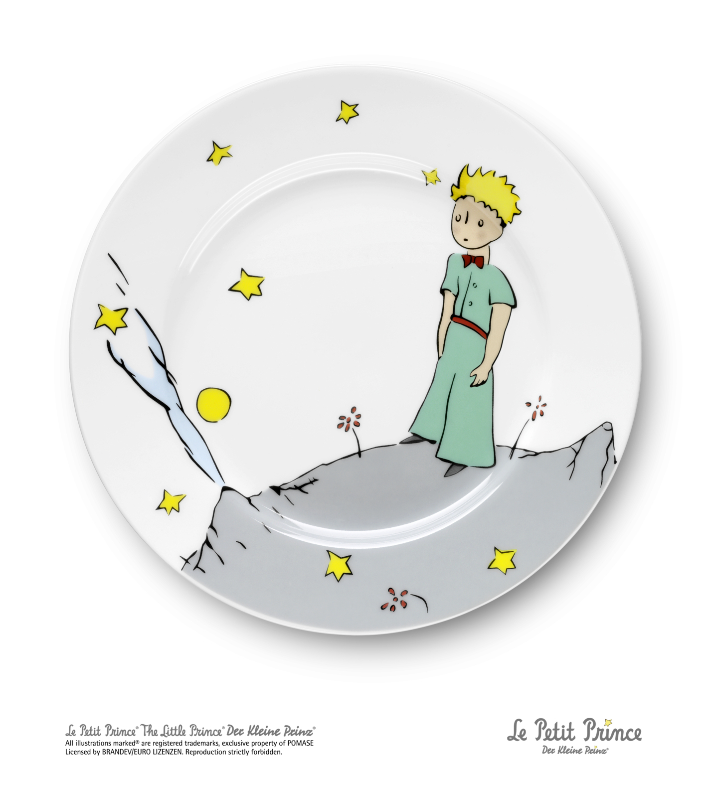 Un piatto bianco con un disegno del Piccolo Principe in piedi su una collina, con stelle.