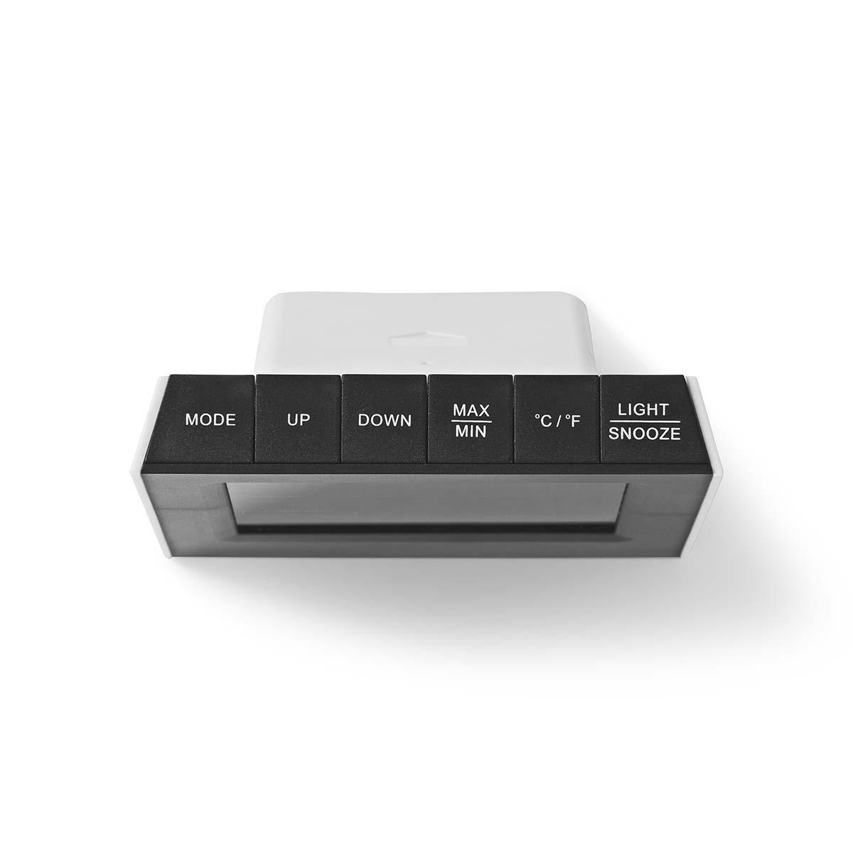 Biały budzik cyfrowy z czarnymi przyciskami, w tym funkcją drzemki.
