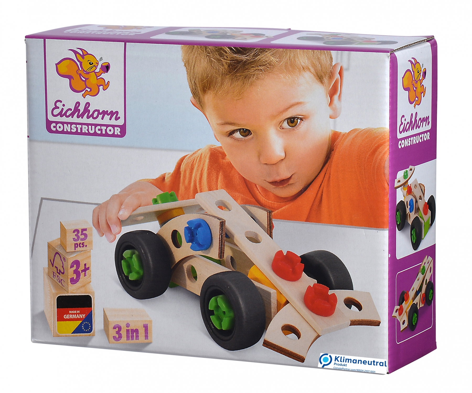 Ein Kinderspielzeugauto, Holz mit Farbteilen und ein Kindergesicht auf der Box.