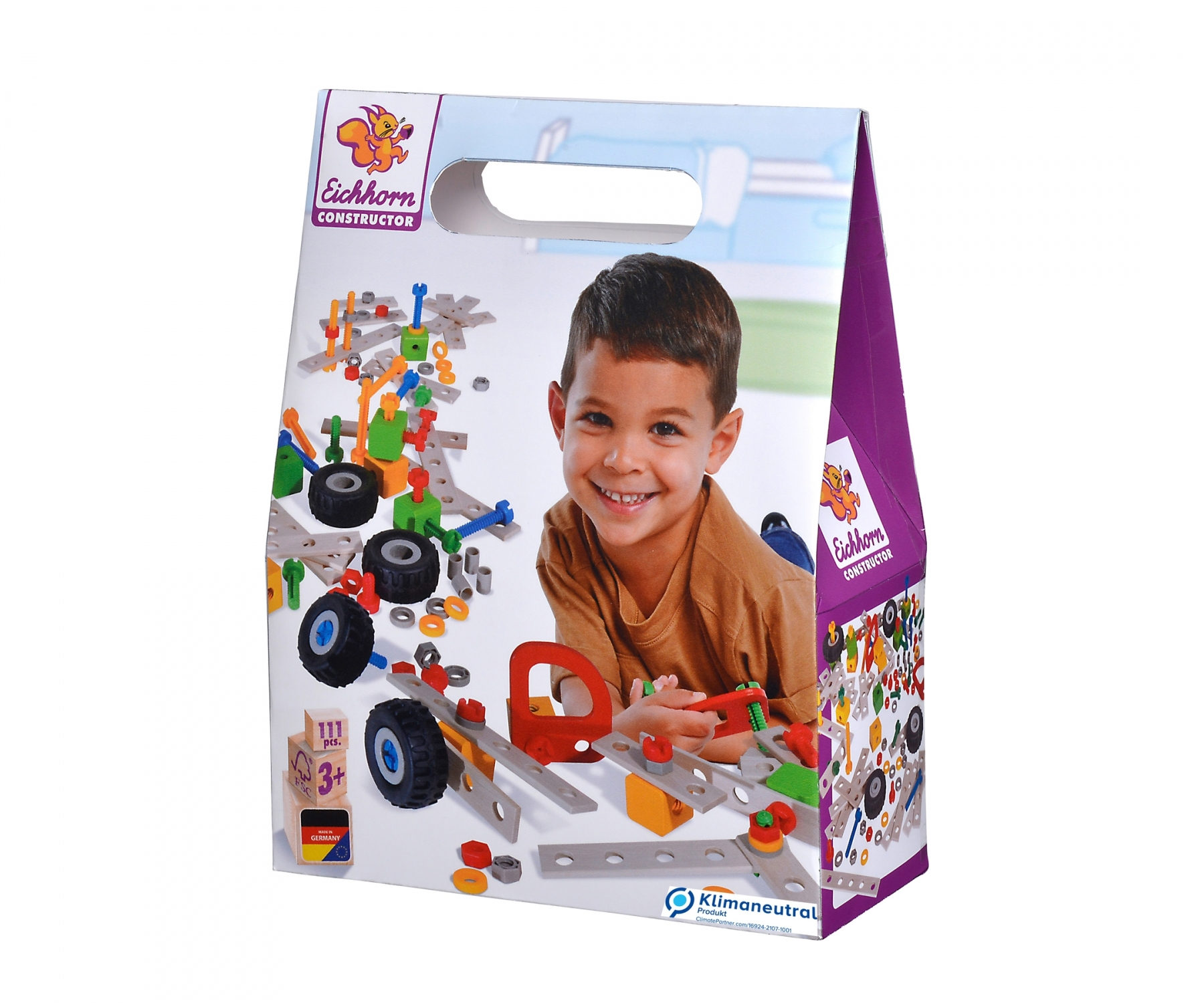 Eine Geschenkbox mit einem lächelnden Jungen und bunten Bausteinen, Spielzeug und dem Text 'Eichhorn Constructor'.