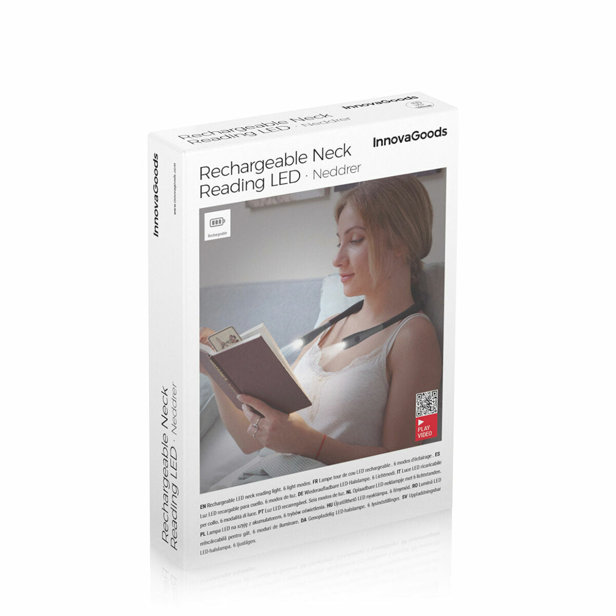Scatola con una donna che legge un libro, intitolata Rechargeable Neck Reading LED, con il logo InnovaGoods.
