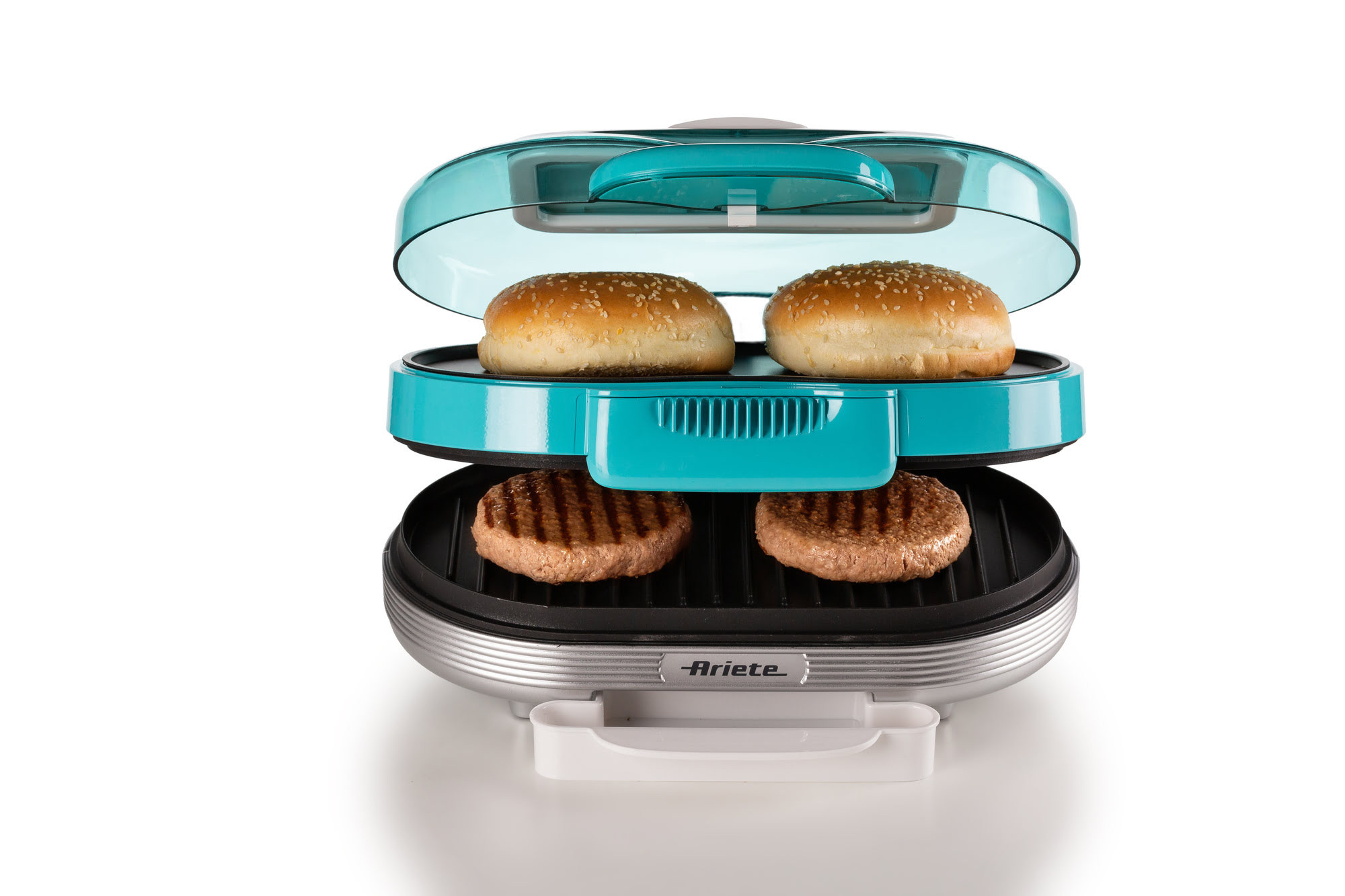 Een hamburgerapparaat met broodjes en burgers erin.