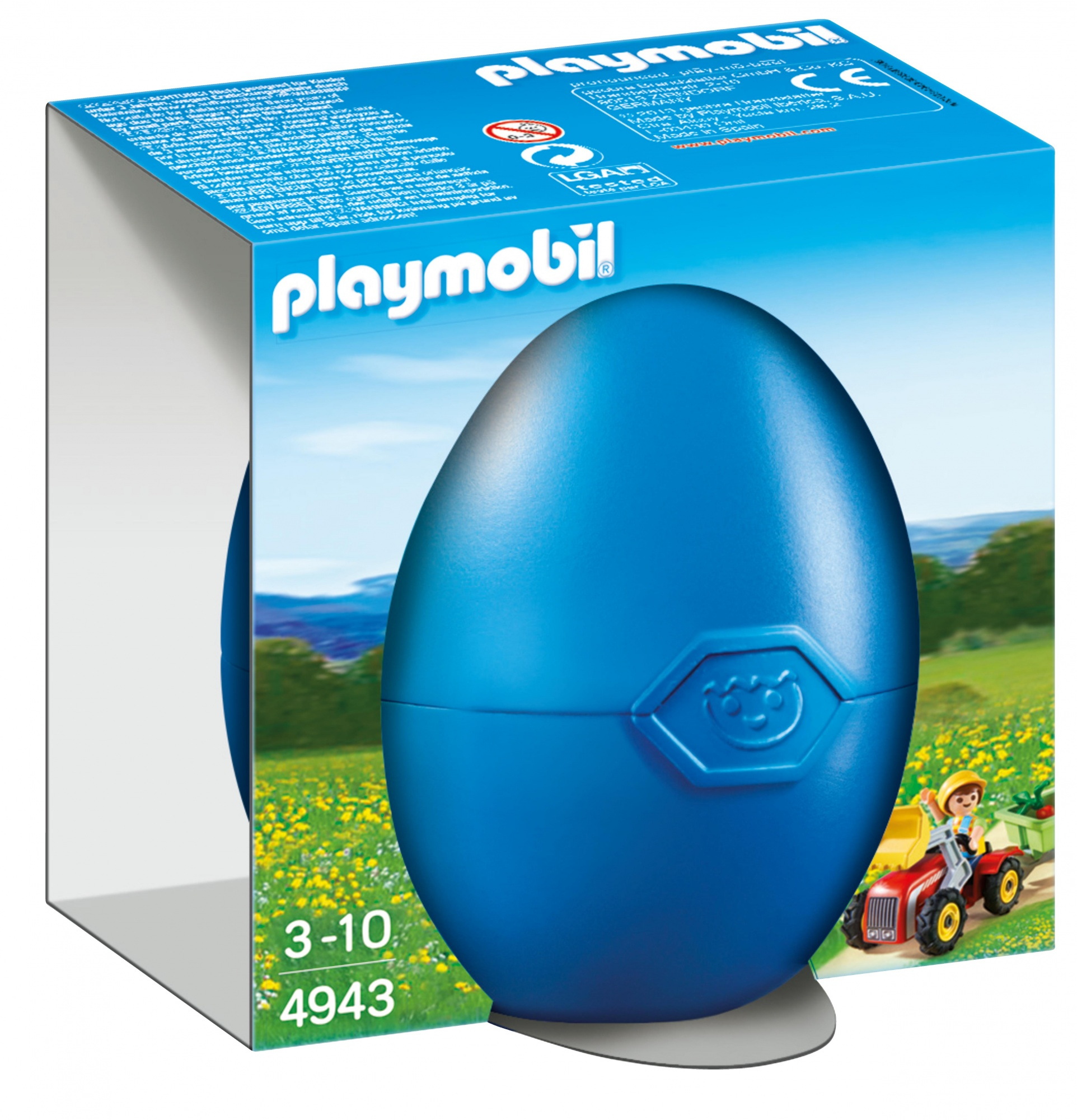Un uovo Playmobil blu con un contadino e un trattore in mostra, con la scatola dietro.