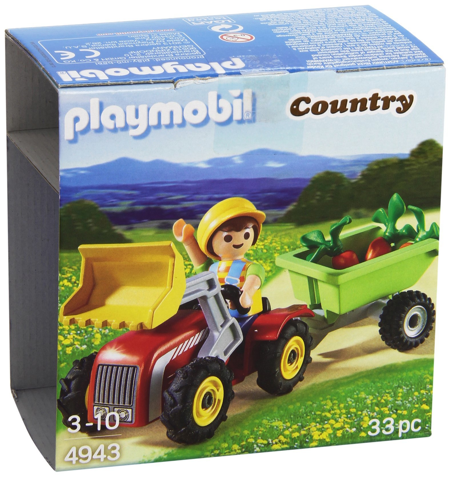 La scatola Playmobil Country mostra un contadino su un trattore rosso che traina un rimorchio verde di verdure.