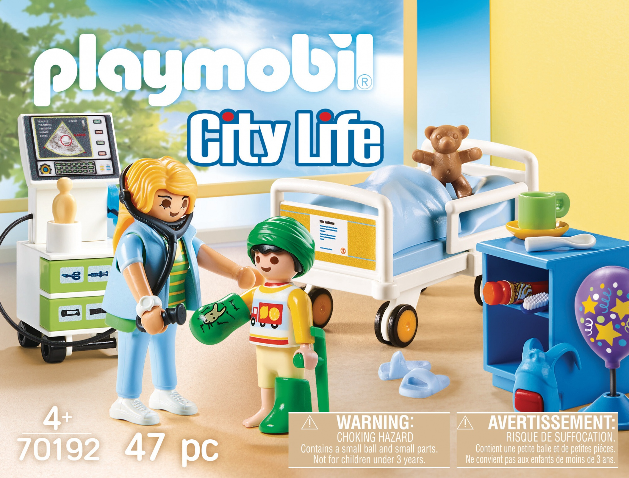 Scena szpitalna Playmobil z lekarzem, dzieckiem, łóżkiem i sprzętem medycznym.