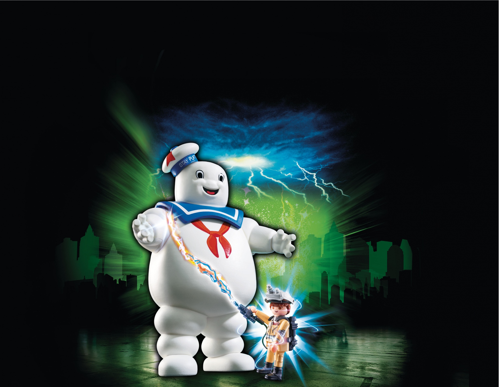 Ghostbusters Playmobil-Set: Stay Puft Marshmallow Man und eine Ghostbuster-Figur mit Energie-Strahl.