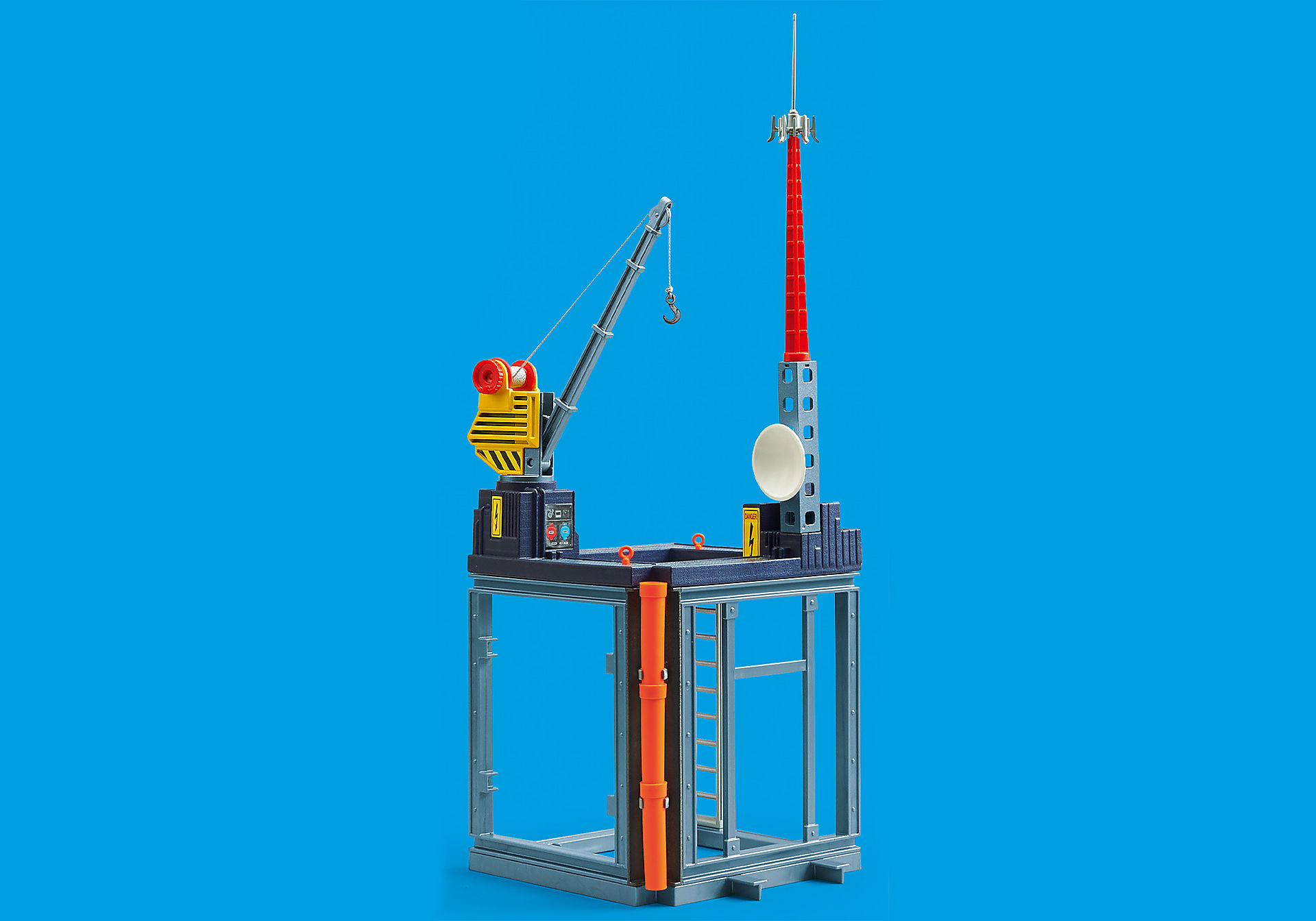 Zabawkowe miejsce budowy z żurawiem, wieżą i anteną na niebieskim tle.
