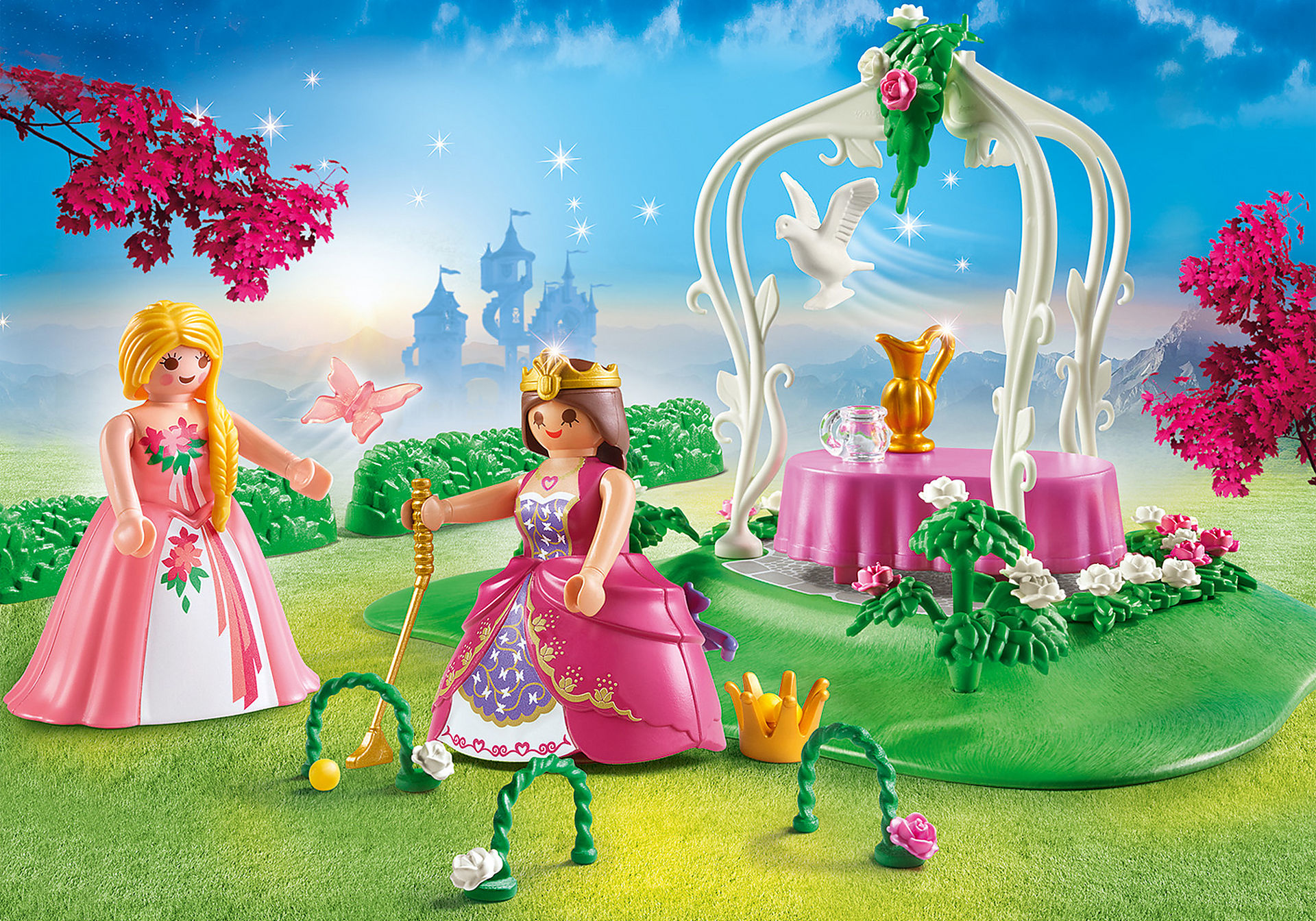 Playmobil-Szene mit Prinzessinnen, weißem Bogen und Burg im Hintergrund.