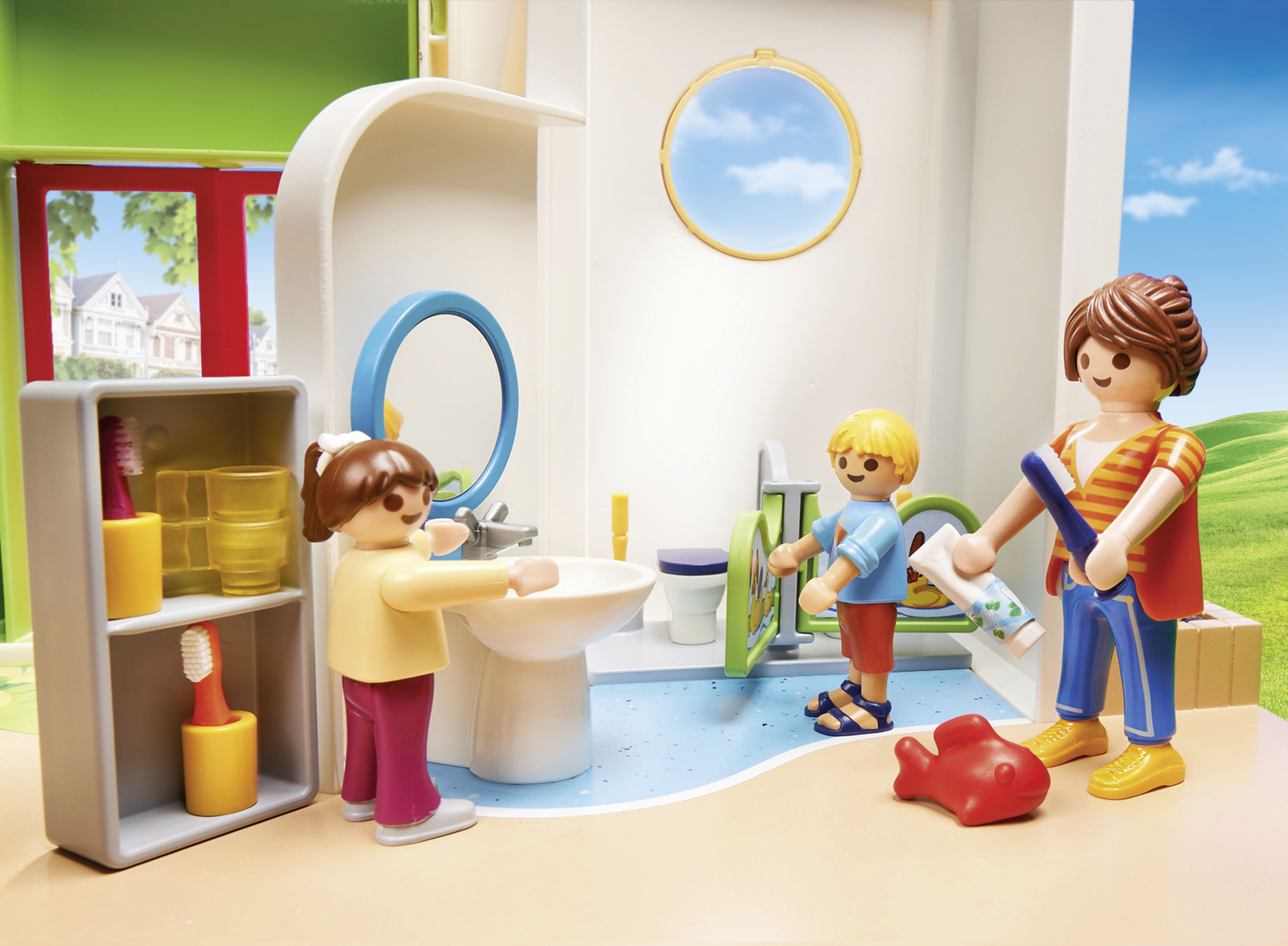 Set Playmobil di un bagno con figure di una madre e due bambini, con un lavandino.