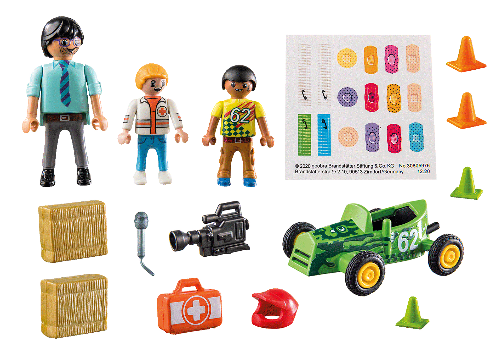 Figurki Playmobil, w tym ludzie, narzędzia takie jak aparat, samochód wyścigowy i apteczka.