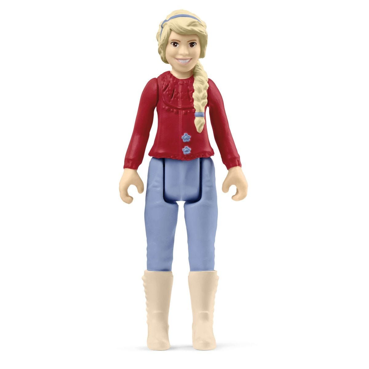 Spielfigur eines Mädchens in roter Jacke und blauer Hose. Sie hat blonde Haare zu einem Zopf geflochten und weiße Stiefel.