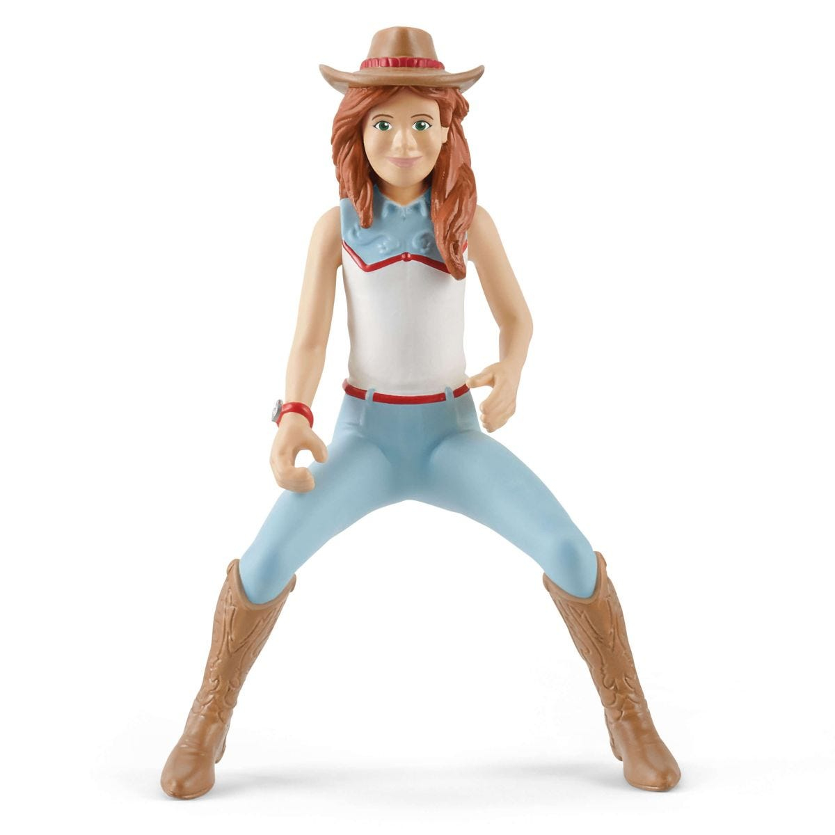 Cowgirl-Figur. Sie trägt einen Cowboyhut, ein weißes Hemd, blaue Hosen, braune Stiefel. Posing.