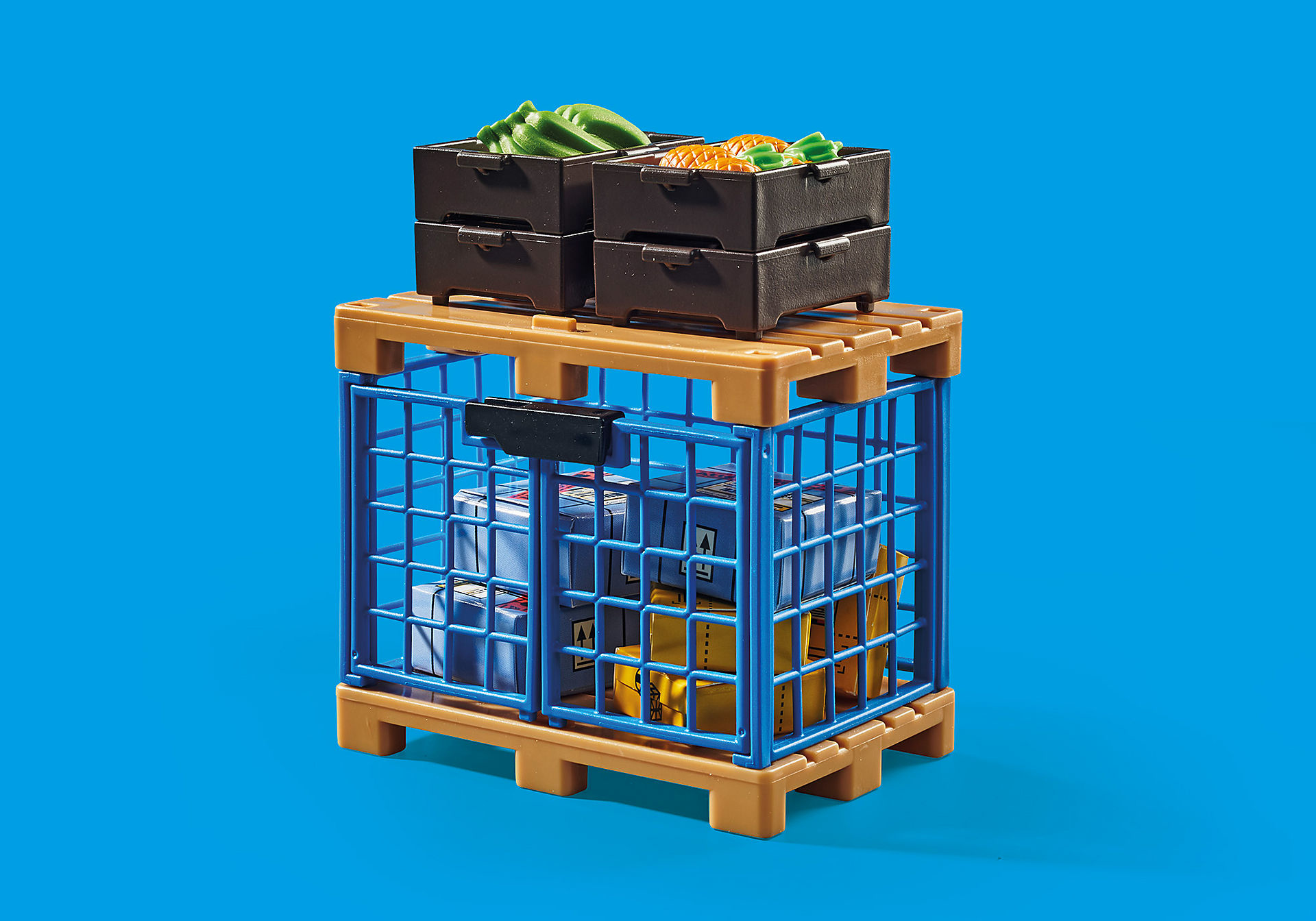 Spielzeugset mit Kisten, Boxen und einer Palette. Kisten enthalten Gemüse. Blauer Hintergrund.