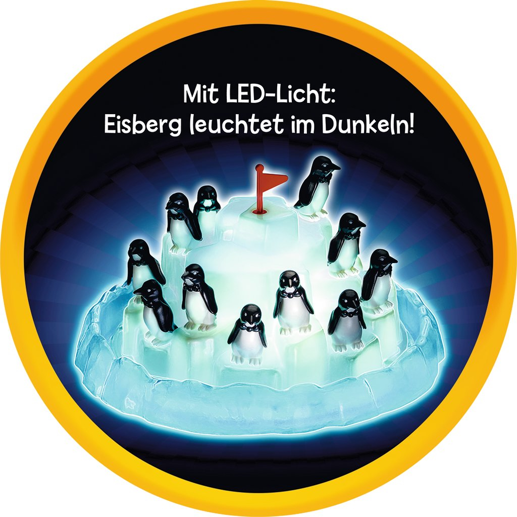 Ein Spielzeug-Eisberg mit Pinguinen, beleuchtet von LED-Lichtern.