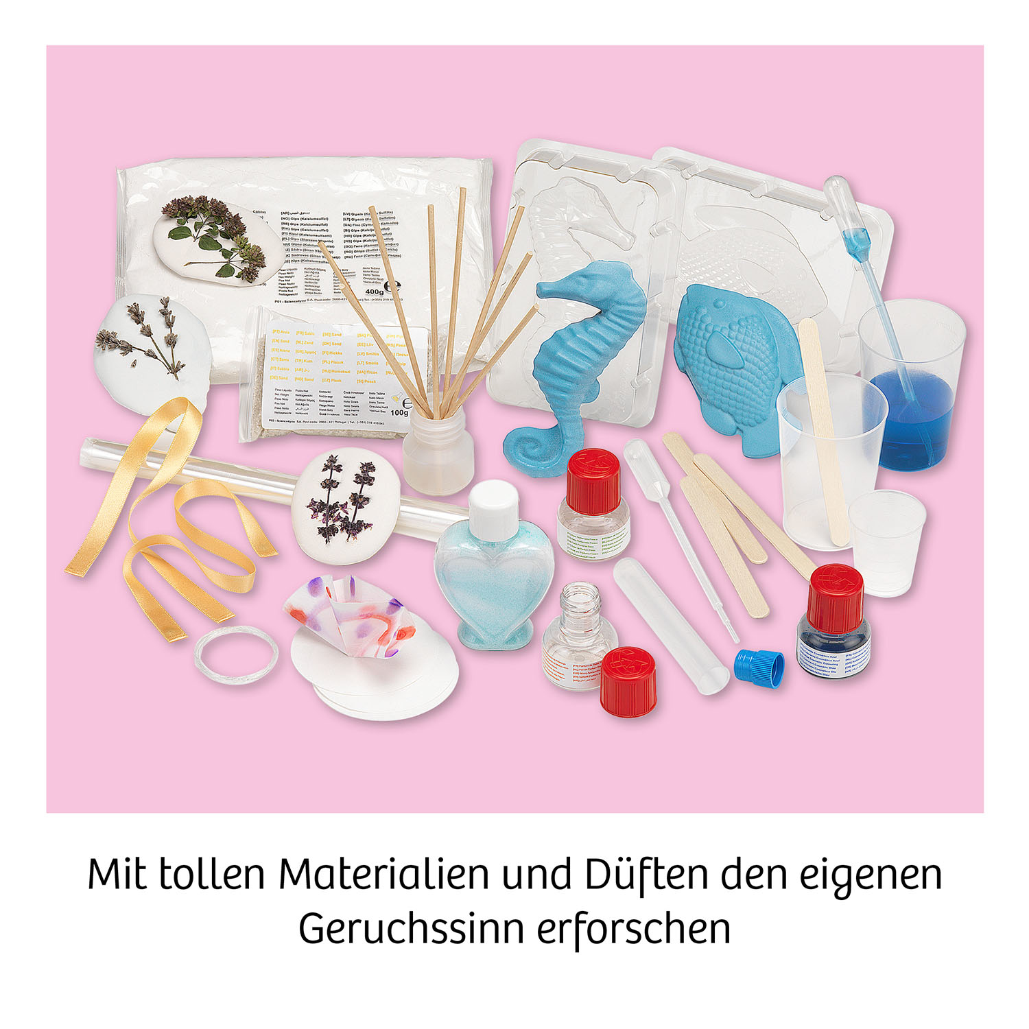 Verschiedene Artikel zur Herstellung von Duftprodukten, darunter Flaschen, Stäbchen und Formen.