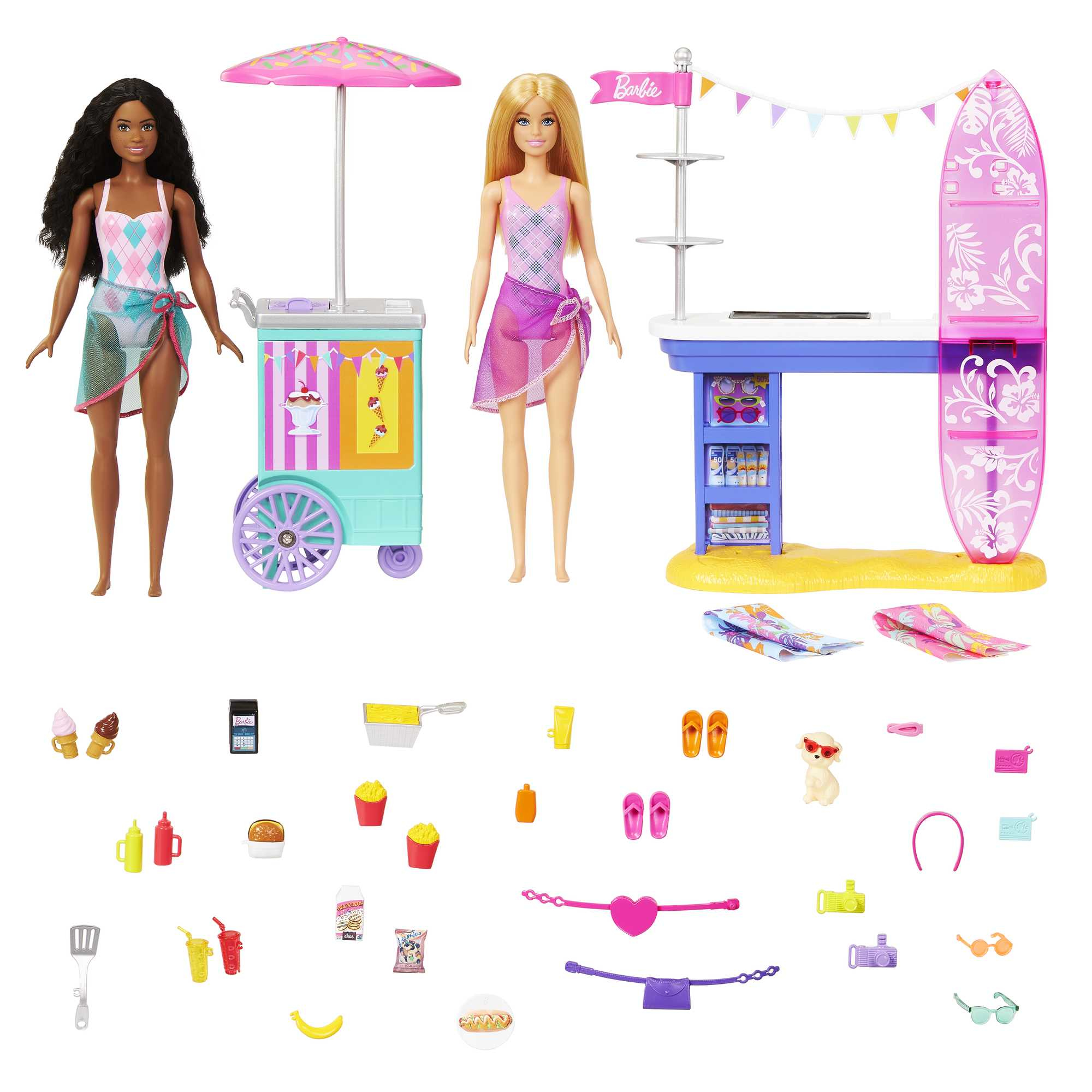 Zwei Barbie-Puppen mit Strandzubehör und einem Imbissstand.