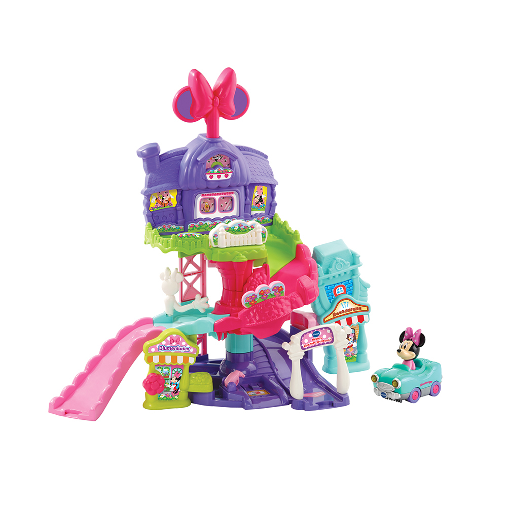 Ein Minnie Mouse Spielset mit Haus, Rutsche und Spielzeugauto.