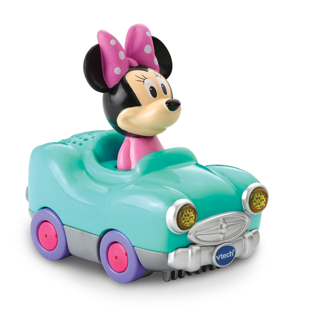 Ein Minnie Maus Spielzeugauto. Minnie sitzt im Auto. Türkis, rosa Schleife.
