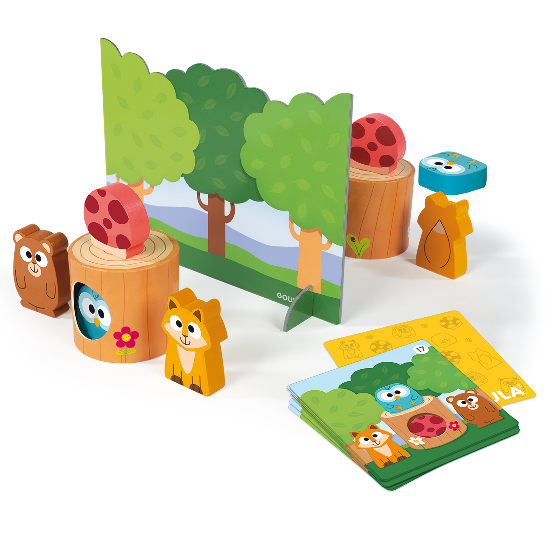 Escena de juguete de madera con animales del bosque y árboles. Hay cartas con imágenes de los animales.