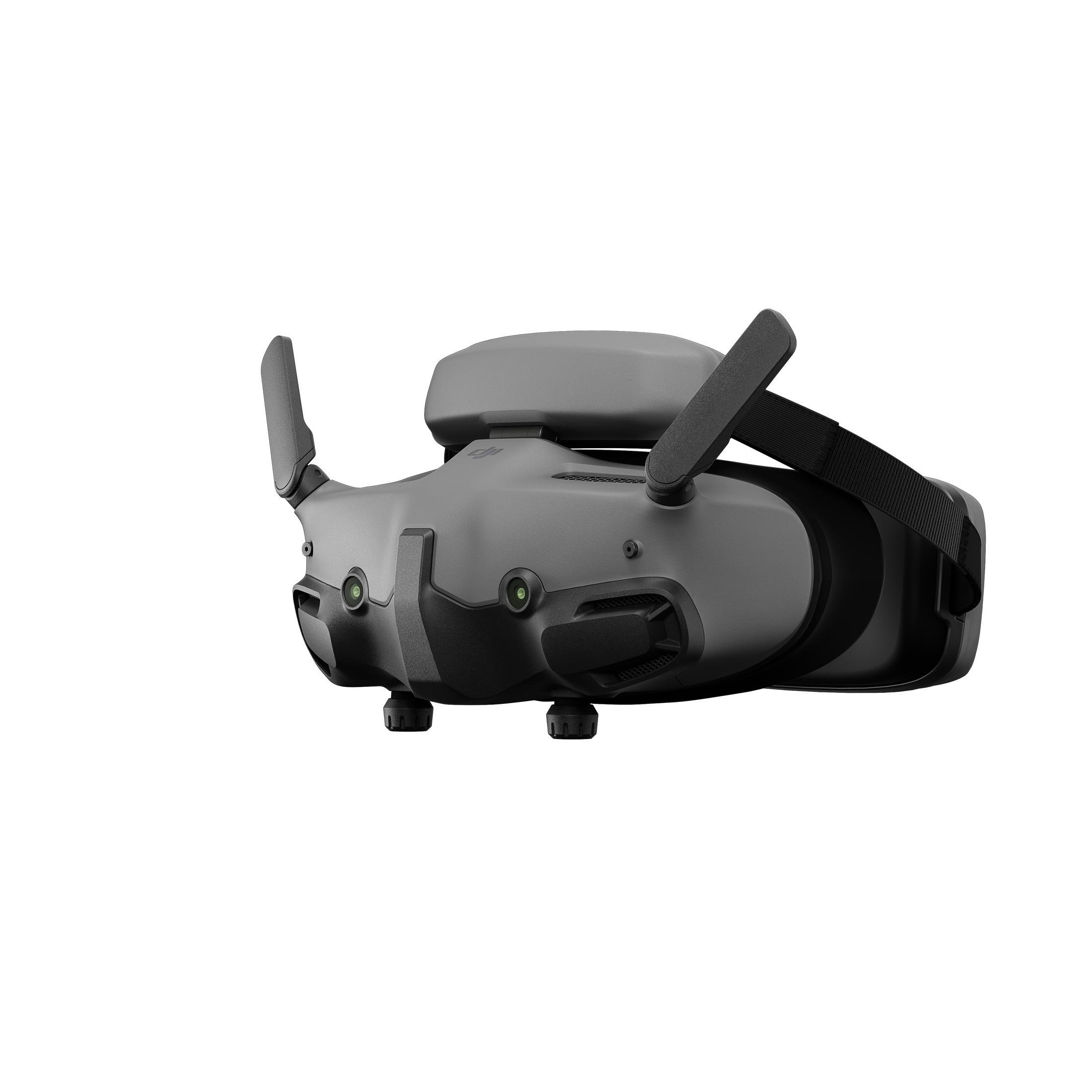 Un occhiale per droni DJI FPV grigio, visto di lato. Ha due antenne e un design per sostenere la testa.