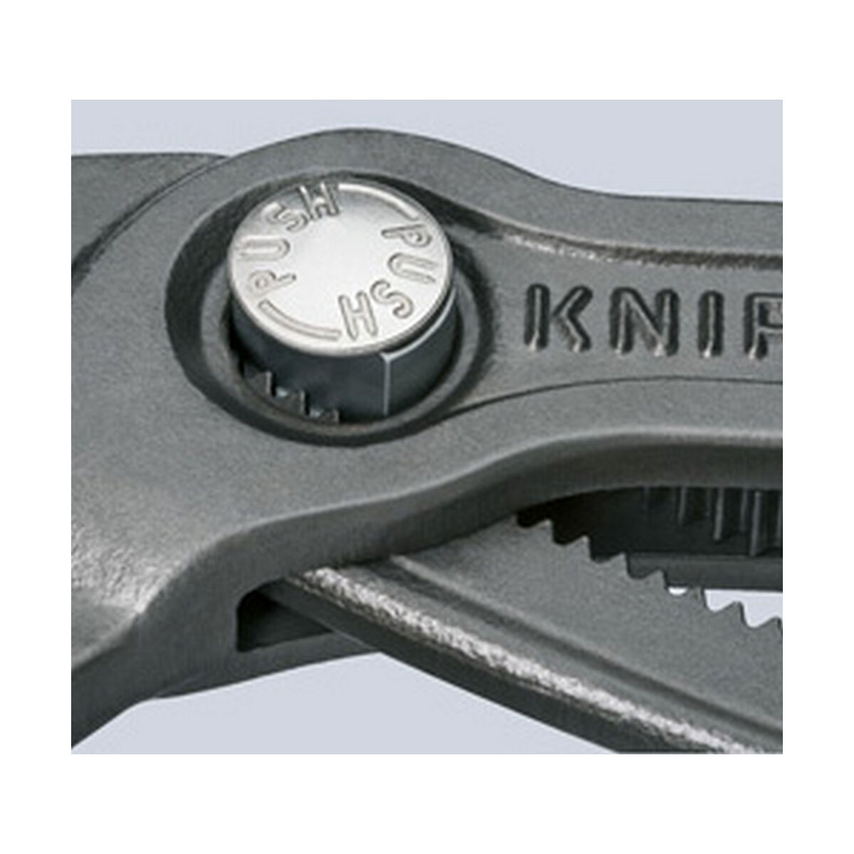 Metal bir aletin kafasının yakın çekimi, bir düğme ve 'KNIPEX' markası ile.
